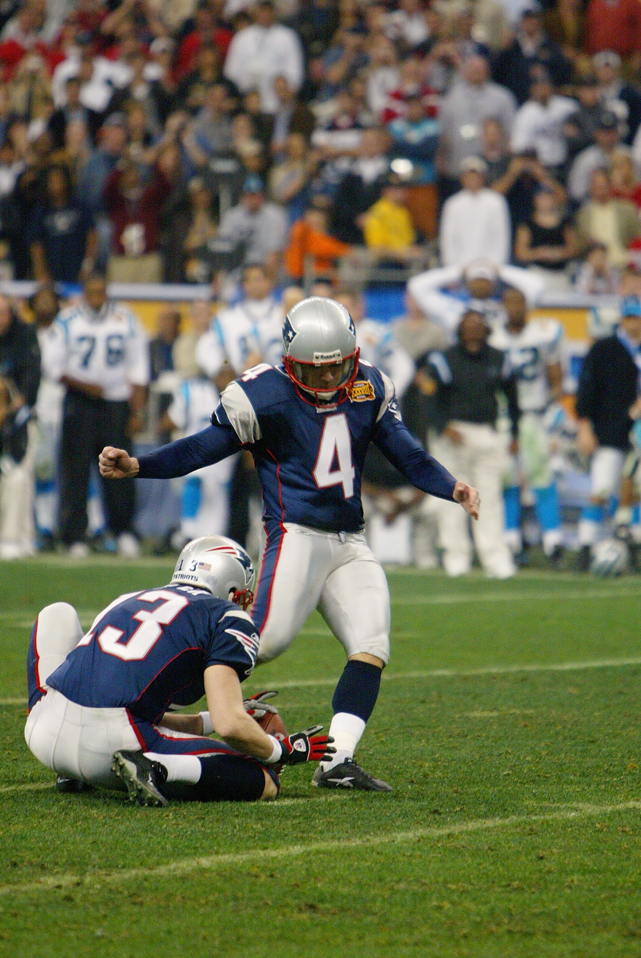 HOUSTON - FEBRUARY 1:  Kicker Adam Vinatieri #4 of the New England Patriots kicks a field goal attempt against the Carolina Panthers during Super Bowl XXXVIII at Reliant Stadium on February 1, 2004 in Houston, Texas.  The Patriots defeated the Panthers 32