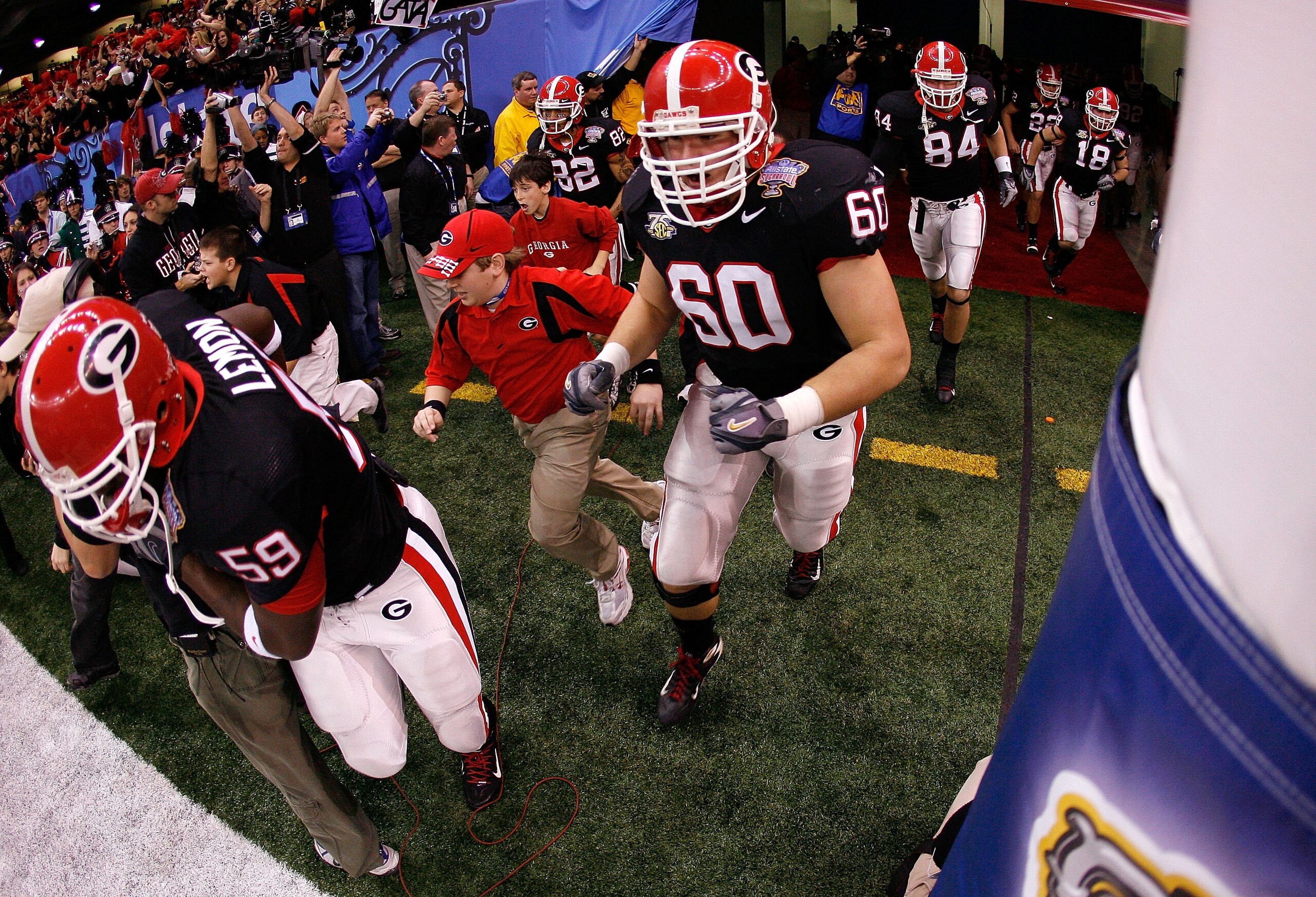 NEW ORLEANS - JANUARY 01:  Clint Boling #60 of the Georgia Bulldogs takes the field against the Hawai'i Warriors during the Allstate Sugar Bowl at the Louisiana Superdome on January 1, 2008 in New Orleans, Louisiana. Georgia won 41-10. (Photo by Chris Gra