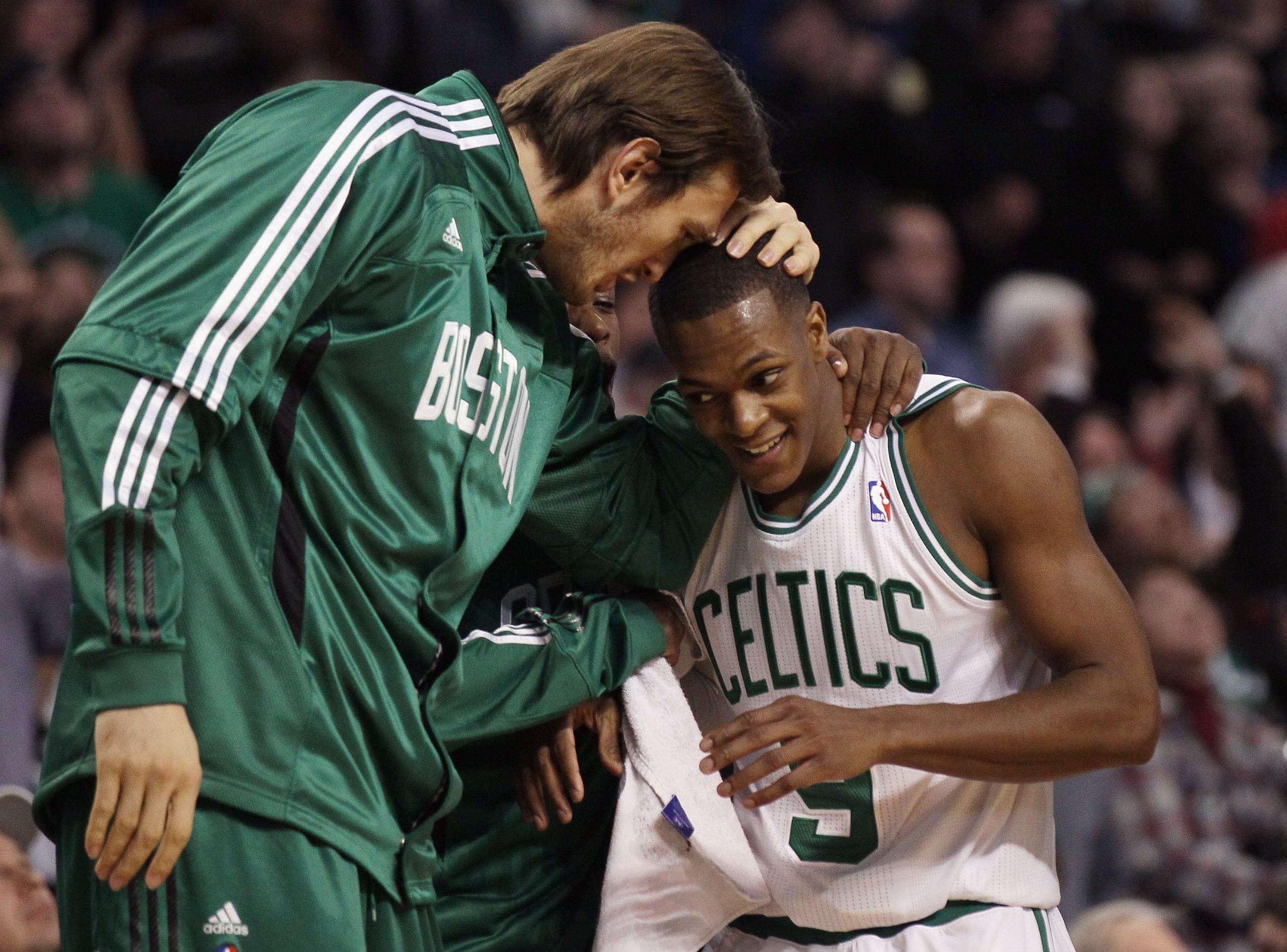 BOSTON, MA - JANUARY 03:  Rajon Rondo #9 of the Boston Celtics is congratulated by teammate Semih Erden #86 after Rondo made a basket in the final minutes of the game against the Minnesota Timberwolves on January 3, 2011 at the TD Garden in Boston, Massac