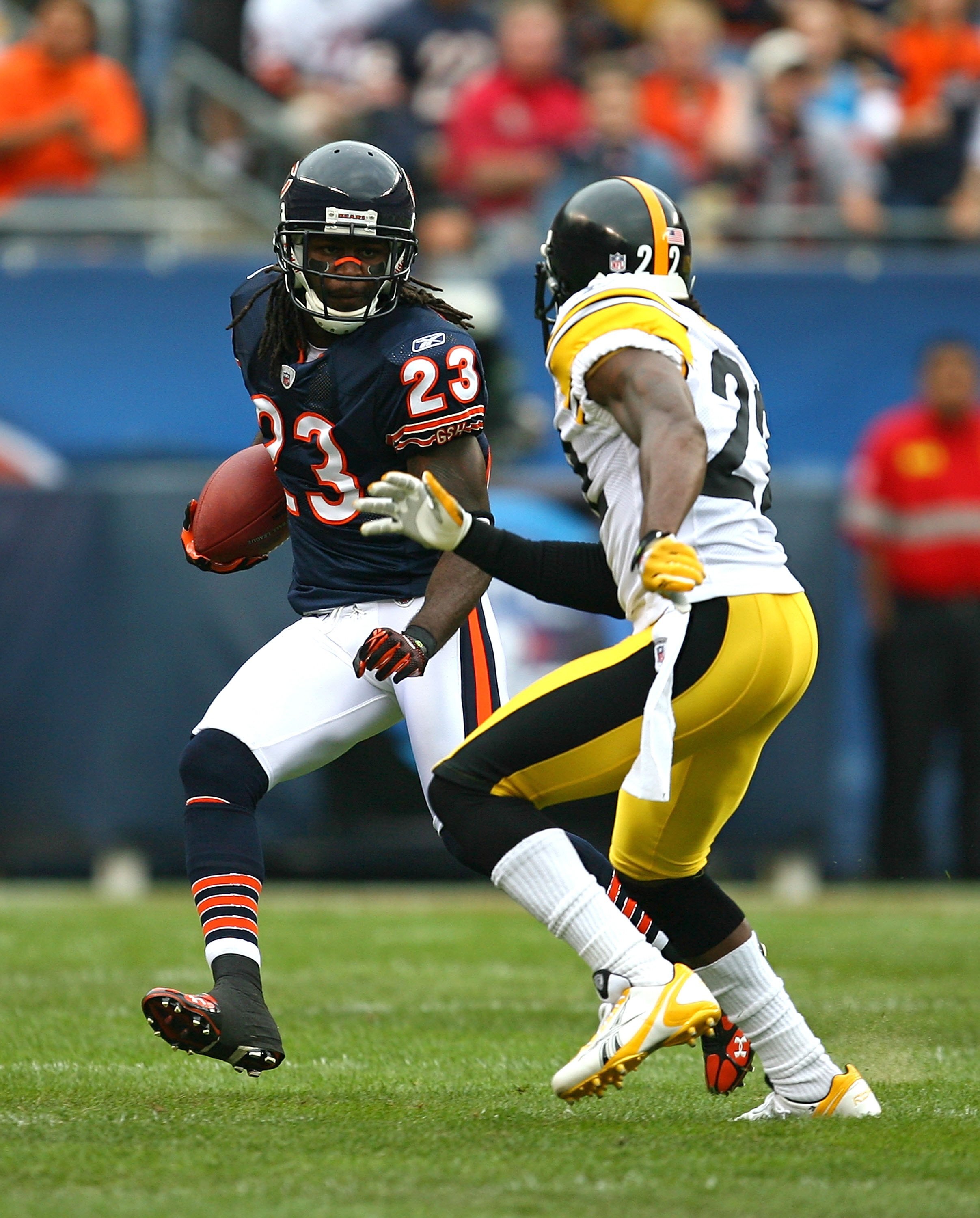 CHICAGO - SEPTEMBER 20: Devin Hetser #23 of the Chicago Bears runs past William Gay #22 of the Pittsburgh Steelers on September 20, 2009 at Soldier Field in Chicago, Illinois. The Bears defeated the Steelers 17-14. (Photo by Jonathan Daniel/Getty Images)
