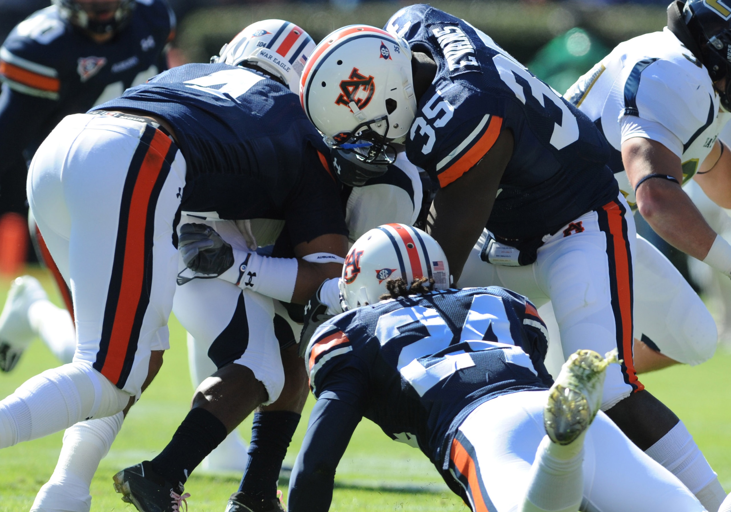 AUBURN, AL - NOVEMBER 6: Special teams players of the Auburn Tigers tackle wide receiver Brian Sutherland #1 of the Chattanooga Mocs on a kickoff return November 6, 2010 at Jordan-Hare Stadium in Auburn, Alabama. (Photo by Al Messerschmidt/Getty Images) AUBURN, AL - NOVEMBER 6: Special teams players of the Auburn Tigers tackle wide receiver Brian Sutherland #1 of the Chattanooga Mocs on a kickoff return November 6, 2010 at Jordan-Hare Stadium in Auburn, Alabama. (Photo by Al Messerschmidt/Getty Images)