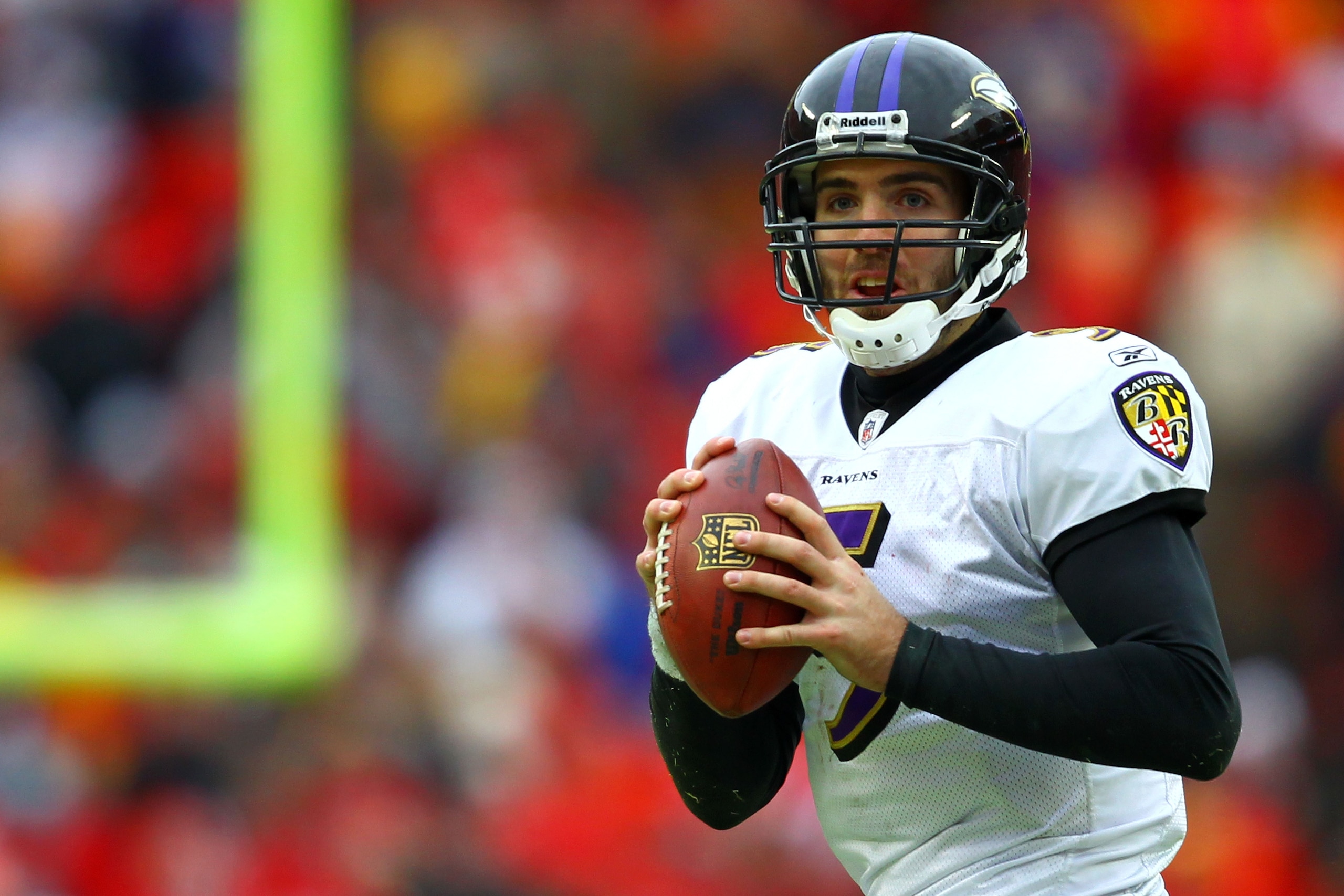 KANSAS CITY, MO - JANUARY 09: Quarterback Joe Flacco #5 of the Baltimore Ravens looks to pass against the Kansas City Chiefs in their 2011 AFC wild card playoff game at Arrowhead Stadium on January 9, 2011 in Kansas City, Missouri. (Photo by Dilip Vishw KANSAS CITY, MO - JANUARY 09: Quarterback Joe Flacco #5 of the Baltimore Ravens looks to pass against the Kansas City Chiefs in their 2011 AFC wild card playoff game at Arrowhead Stadium on January 9, 2011 in Kansas City, Missouri. (Photo by Dilip Vishw