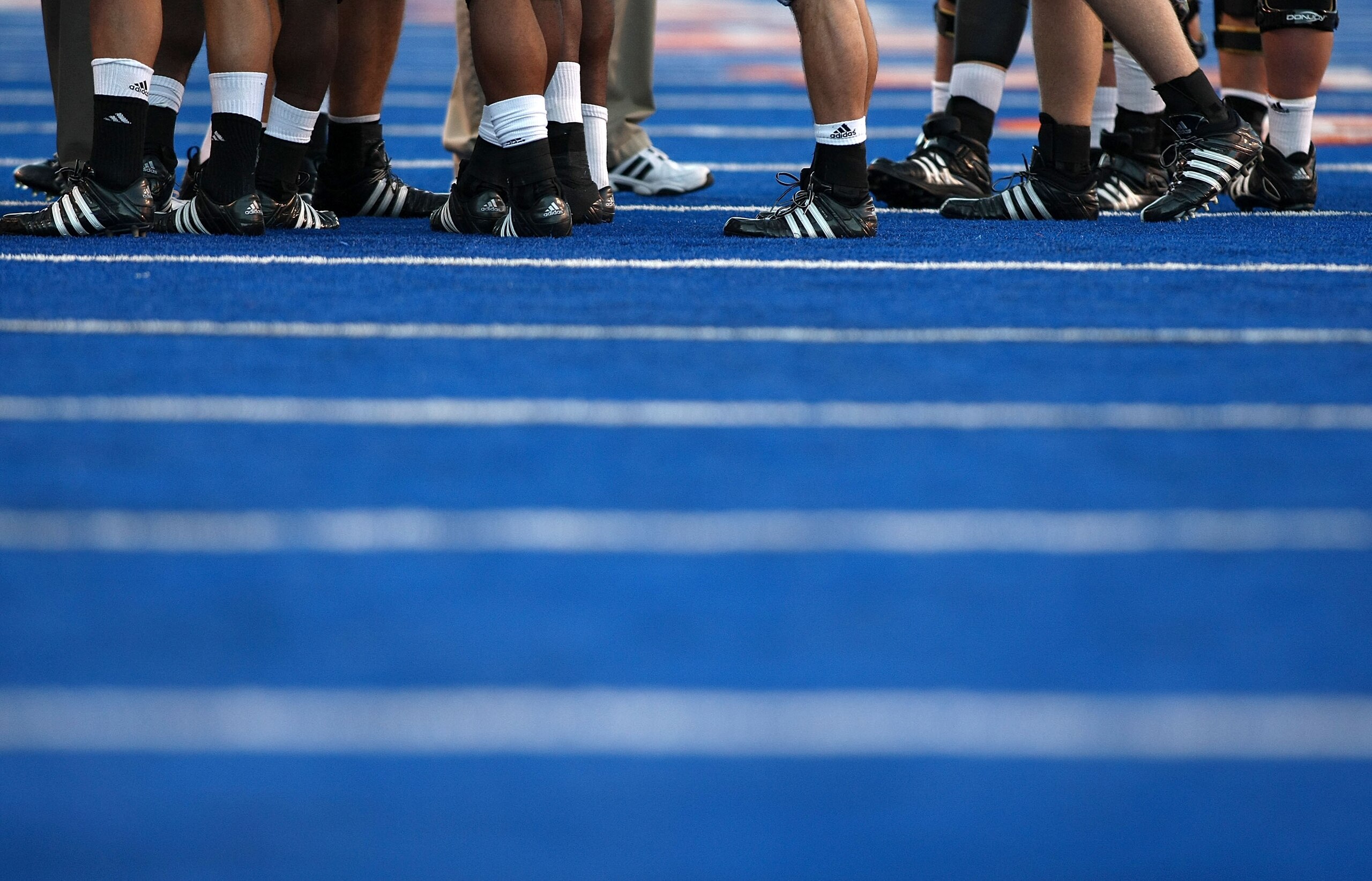 BOISE , ID - SEPTEMBER 13: A general view of players cleets on the blue turf during the game between Boise State Broncos and Bowling Green Falcons at Bronco Stadium on September 13, 2008 in Boise, Idaho. (Photo by Jonathan Ferrey/Getty Images) BOISE , ID - SEPTEMBER 13: A general view of players cleets on the blue turf during the game between Boise State Broncos and Bowling Green Falcons at Bronco Stadium on September 13, 2008 in Boise, Idaho. (Photo by Jonathan Ferrey/Getty Images)