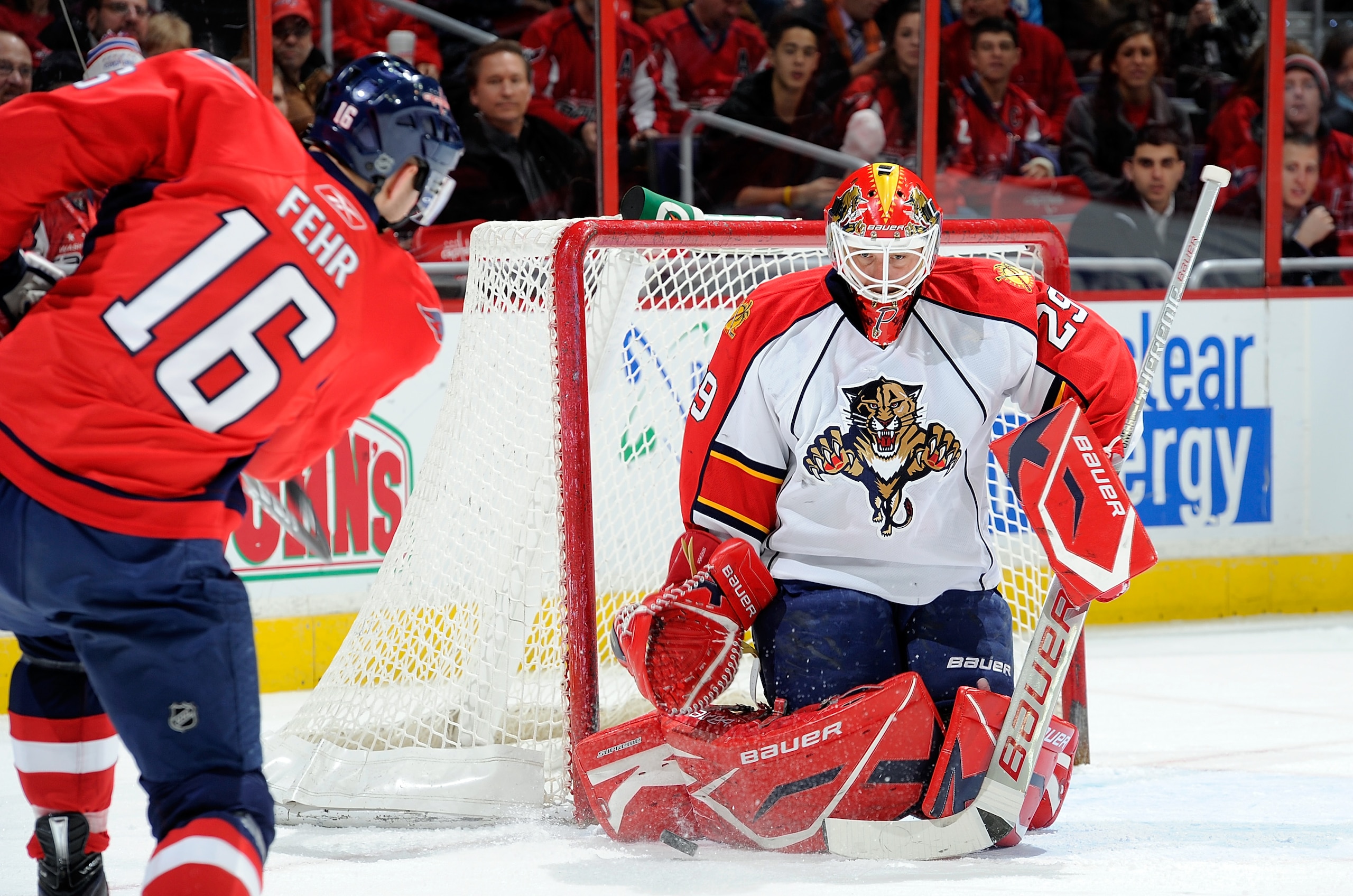 WASHINGTON, DC - DECEMBER 9:  Tomas Vokoun #29 of the Florida Panthers makes a save against Eric Fehr #16 of the Washington Capitals at the Verizon Center on December 9, 2010 in Washington, DC.  (Photo by Greg Fiume/Getty Images)