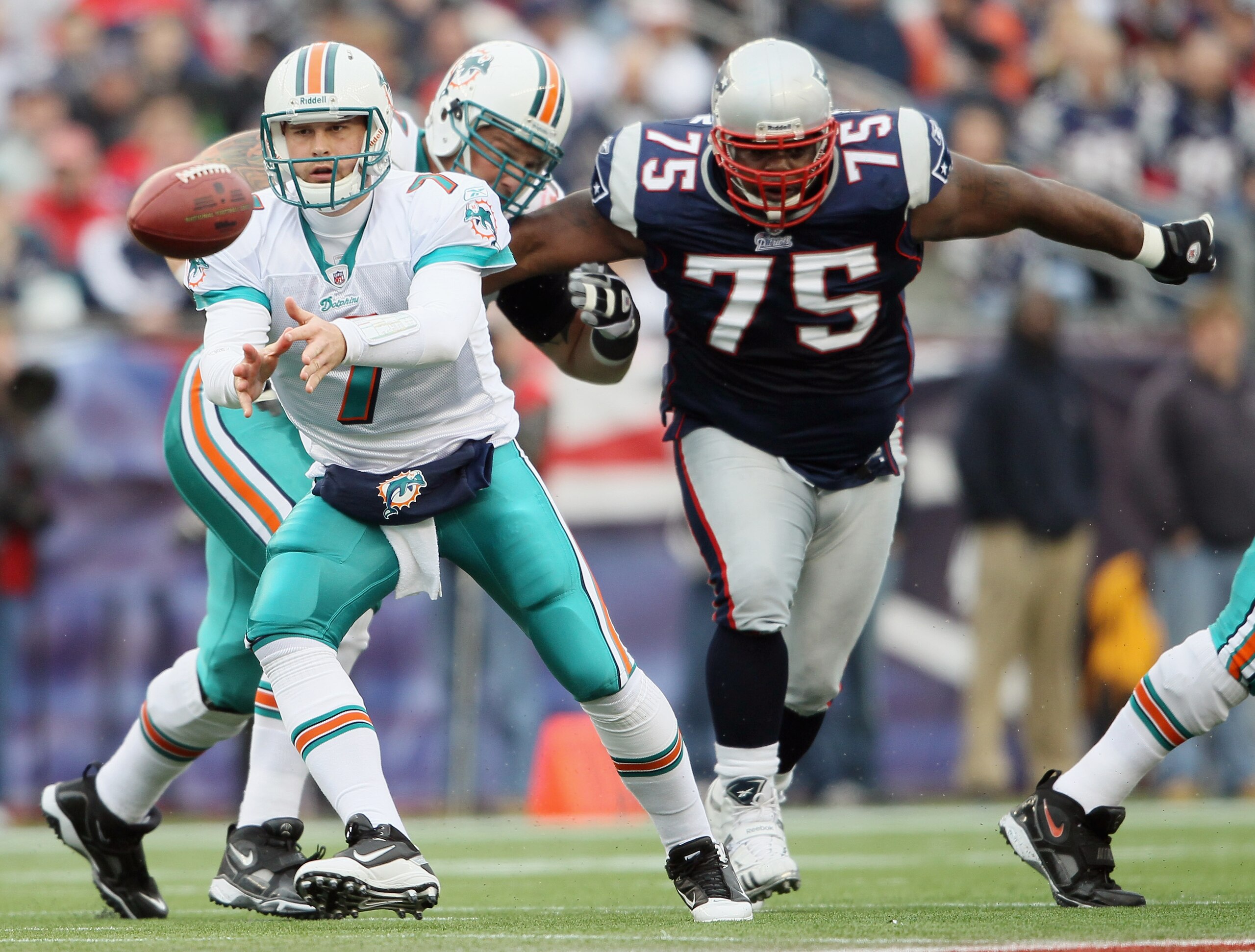 FOXBORO, MA - JANUARY 02: Chad Henne #7 of the Miami Dolphins pitches the ball as Vince Wilfork #75 of the New England Patriots closes in on January 2, 2011 at Gillette Stadium in Foxboro, Massachusetts. (Photo by Elsa/Getty Images) FOXBORO, MA - JANUARY 02: Chad Henne #7 of the Miami Dolphins pitches the ball as Vince Wilfork #75 of the New England Patriots closes in on January 2, 2011 at Gillette Stadium in Foxboro, Massachusetts. (Photo by Elsa/Getty Images)