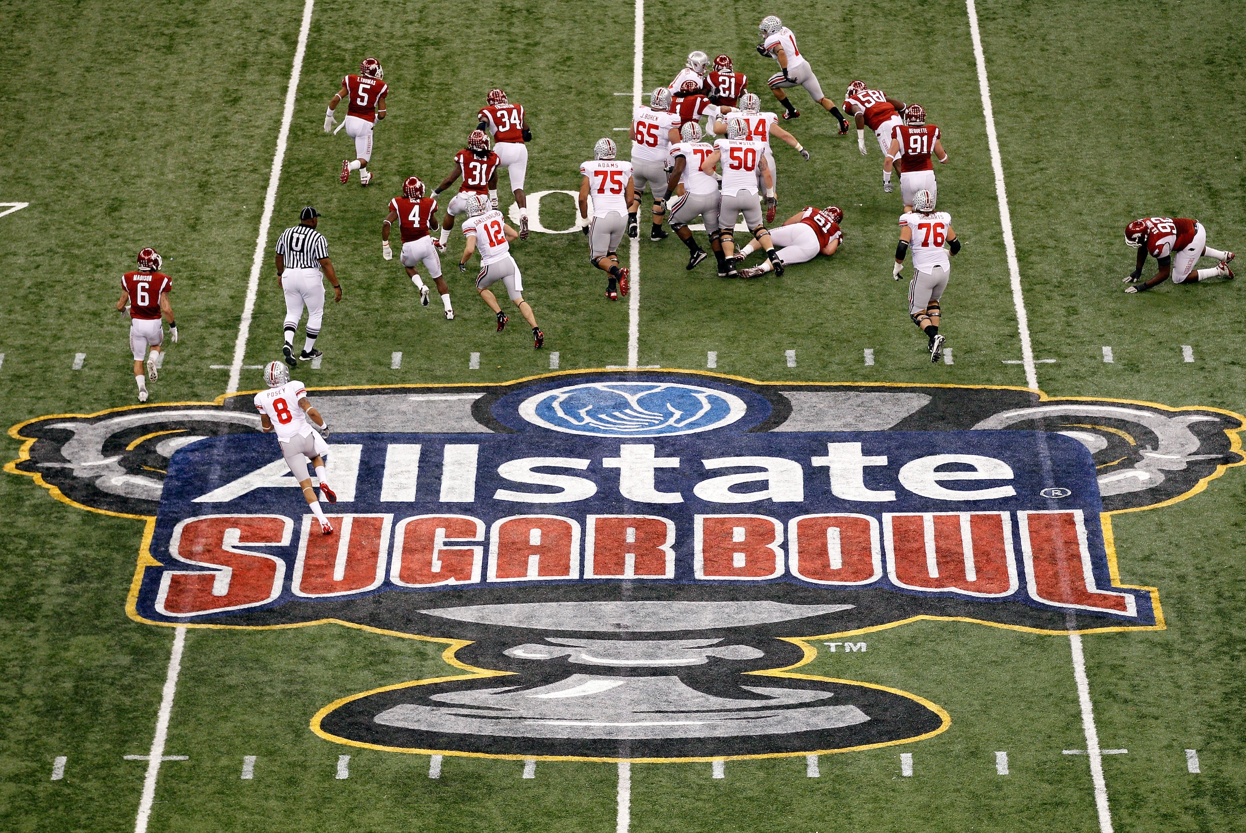 NEW ORLEANS, LA - JANUARY 04: Dan Herron #1 of the Ohio State Buckeyes runs the ball in the first half against the Arkansas Razorbacks during the Allstate Sugar Bowl at the Louisiana Superdome on January 4, 2011 in New Orleans, Louisiana. (Photo by Chri NEW ORLEANS, LA - JANUARY 04: Dan Herron #1 of the Ohio State Buckeyes runs the ball in the first half against the Arkansas Razorbacks during the Allstate Sugar Bowl at the Louisiana Superdome on January 4, 2011 in New Orleans, Louisiana. (Photo by Chri