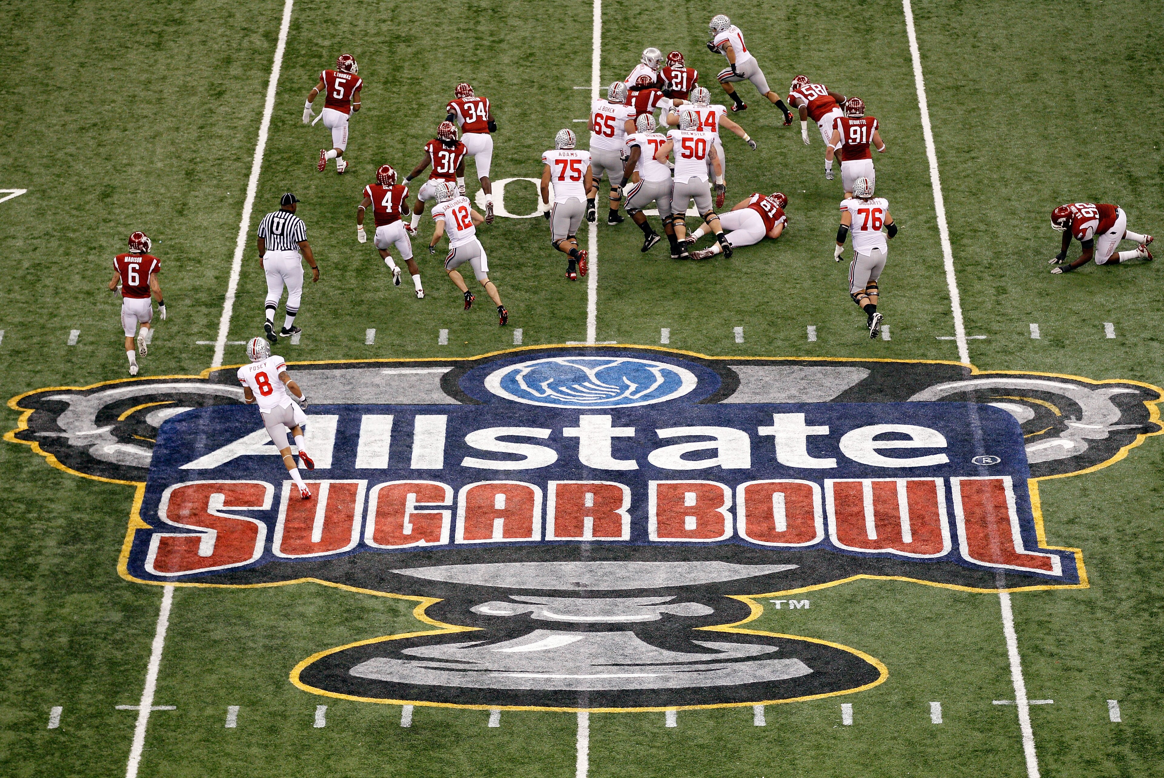 NEW ORLEANS, LA - JANUARY 04: Dan Herron #1 of the Ohio State Buckeyes runs the ball in the first half against the Arkansas Razorbacks during the Allstate Sugar Bowl at the Louisiana Superdome on January 4, 2011 in New Orleans, Louisiana. (Photo by Chri NEW ORLEANS, LA - JANUARY 04: Dan Herron #1 of the Ohio State Buckeyes runs the ball in the first half against the Arkansas Razorbacks during the Allstate Sugar Bowl at the Louisiana Superdome on January 4, 2011 in New Orleans, Louisiana. (Photo by Chri