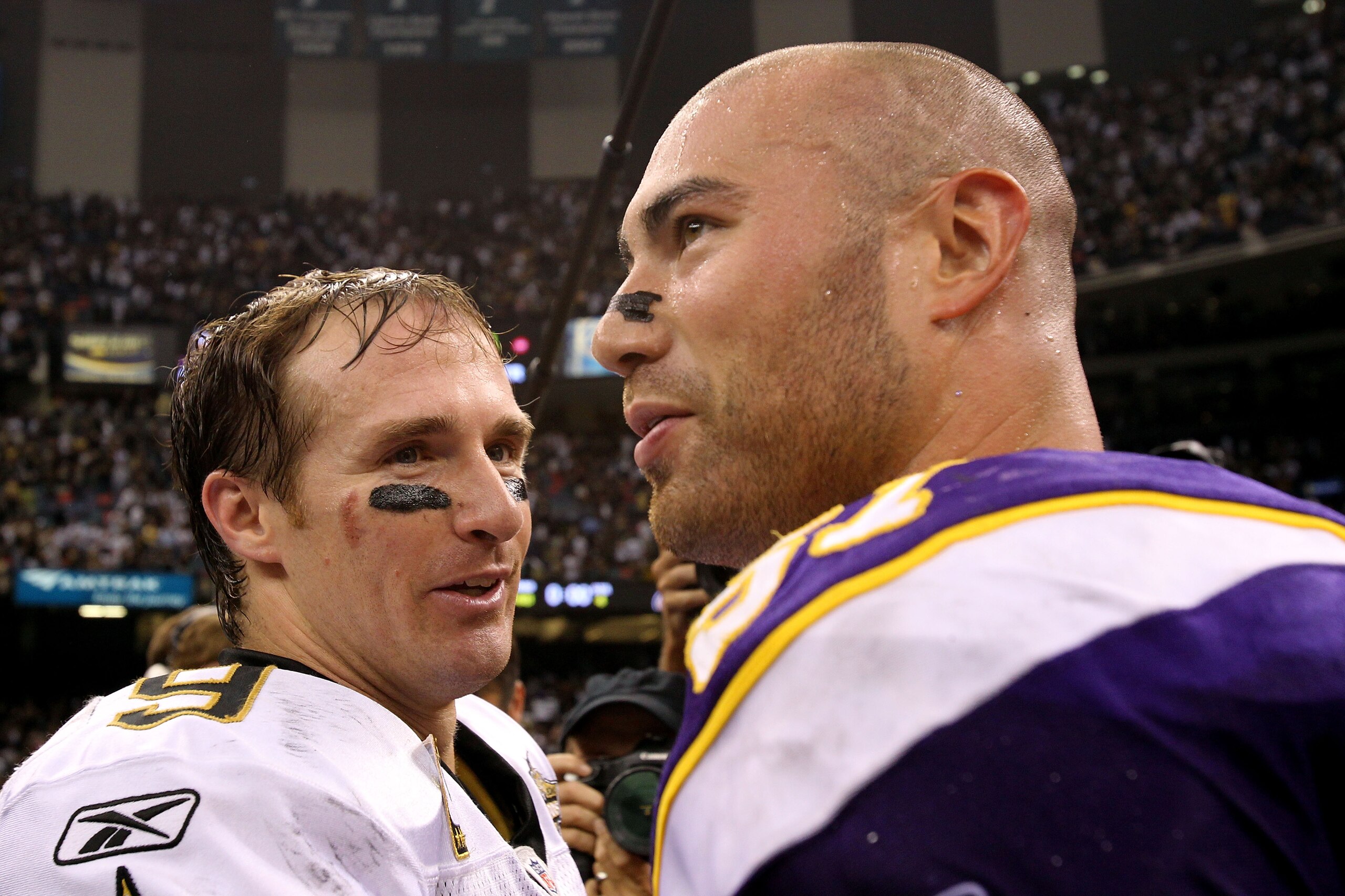 NEW ORLEANS - SEPTEMBER 09:  Drew Brees #9 of the New Orleans Saints talks with Ben Leber #51 of the Minnesota Vikings afte the Saints won 14-9 at Louisiana Superdome on September 9, 2010 in New Orleans, Louisiana.  (Photo by Ronald Martinez/Getty Images)