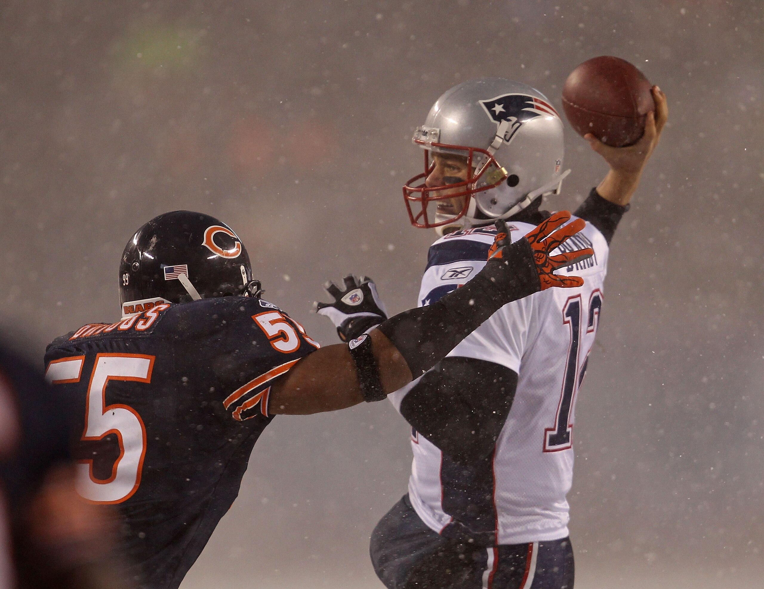CHICAGO - DECEMBER 12: Tom Brady #12 of the New England Patriots throws a pass under pressure from Lance Briggs #55 of the Chicago Bears at Soldier Field on December 12, 2010 in Chicago, Illinois. (Photo by Jonathan Daniel/Getty Images) CHICAGO - DECEMBER 12: Tom Brady #12 of the New England Patriots throws a pass under pressure from Lance Briggs #55 of the Chicago Bears at Soldier Field on December 12, 2010 in Chicago, Illinois. (Photo by Jonathan Daniel/Getty Images)