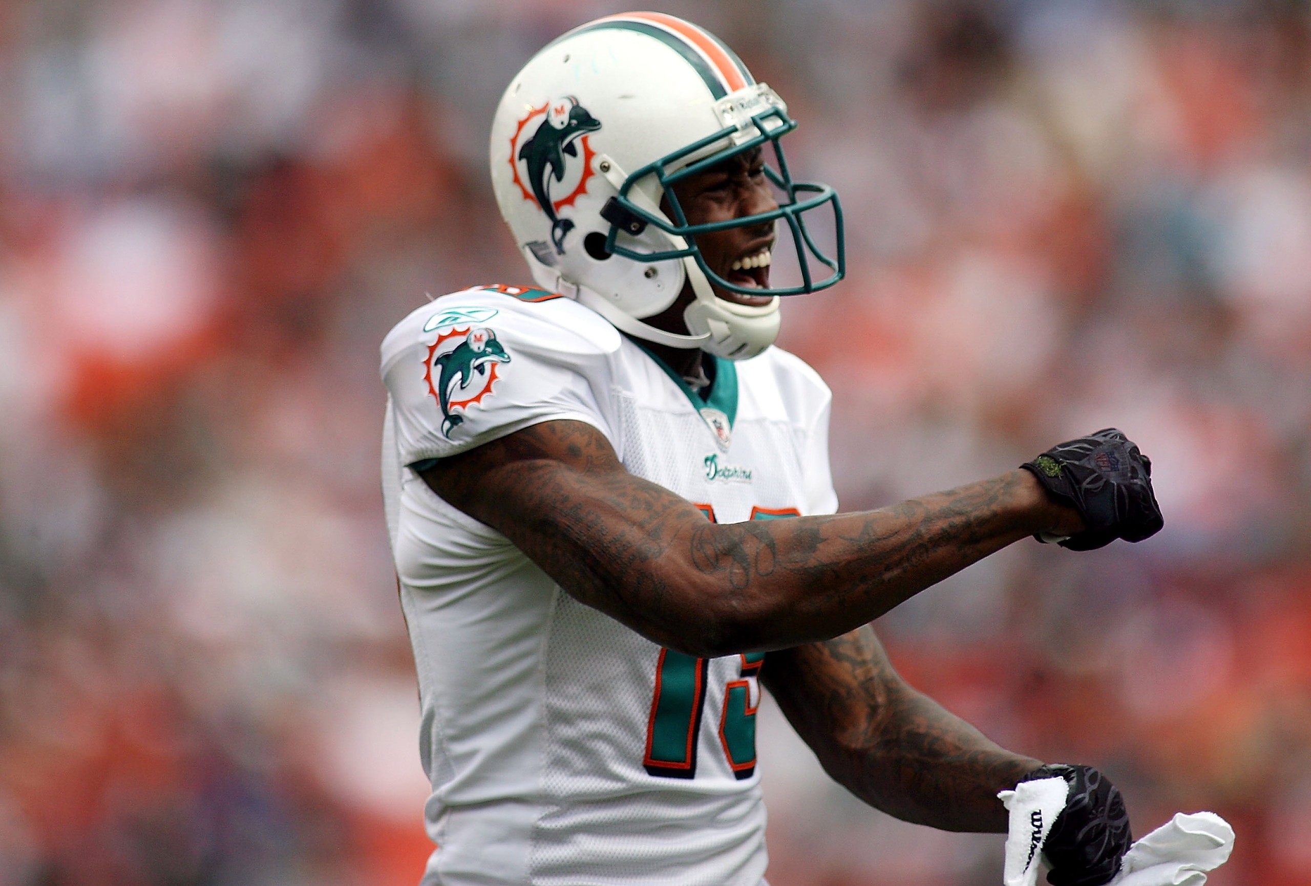 MIAMI, FL - DECEMBER 19:  Receiver Brandon Marshall #19 of the Miami Dolphins reacts during a game against the Buffalo Bills at Sun Life Stadium on December 19, 2010 in Miami, Florida. The Bills defeated the Dolphins 17-14.  (Photo by Marc Serota/Getty Im