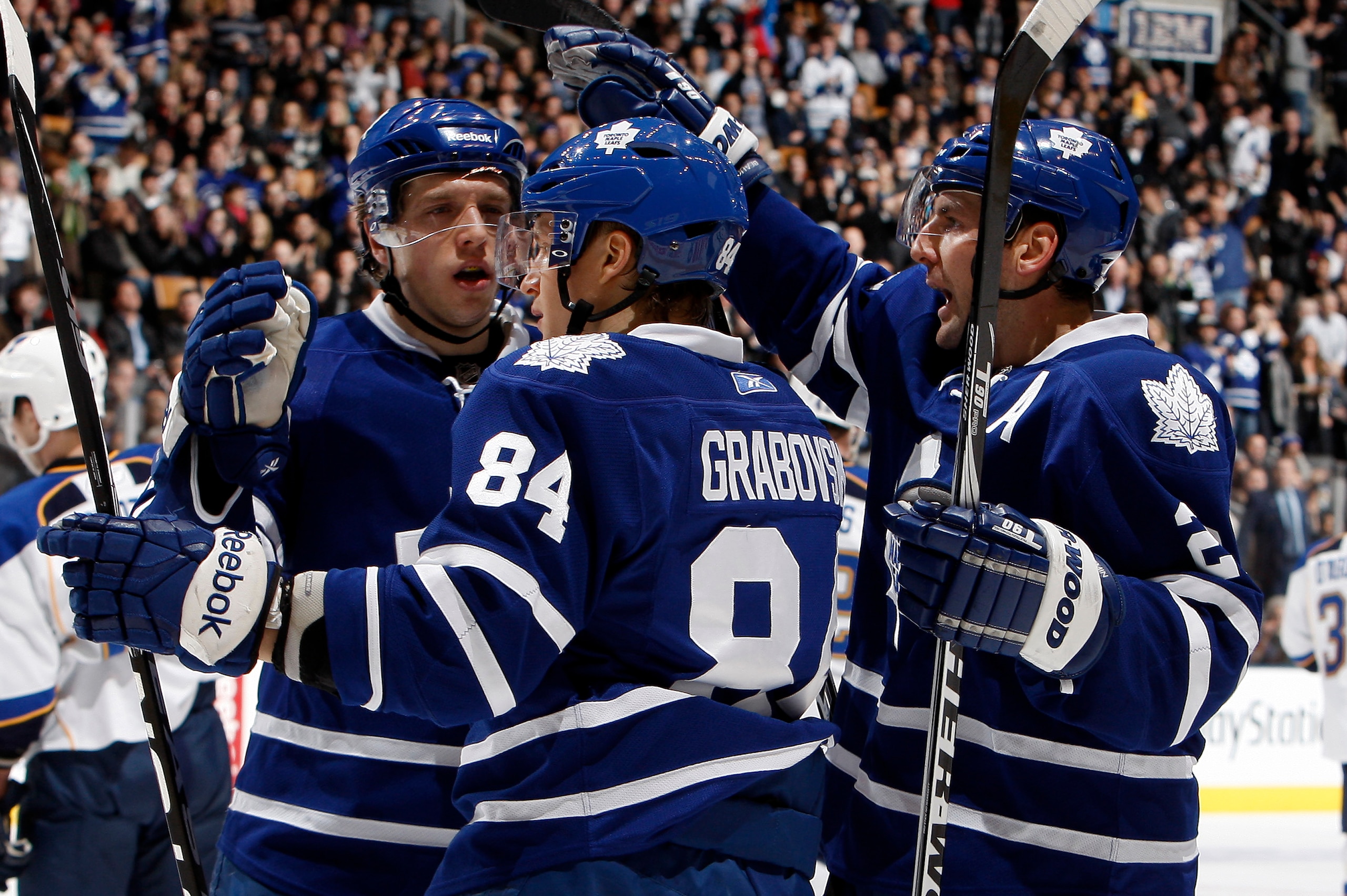 TORONTO, CANADA - JANUARY 6: Nikolai Kulemin #41, Mikhail Grabovski #84 and Francois Beauchemin #22 of the Toronto Maple Leafs celebrate Mikhail Grabovski goal against the St. Louis Blues during game action at the Air Canada Centre January 6, 2011 in Toro TORONTO, CANADA - JANUARY 6: Nikolai Kulemin #41, Mikhail Grabovski #84 and Francois Beauchemin #22 of the Toronto Maple Leafs celebrate Mikhail Grabovski goal against the St. Louis Blues during game action at the Air Canada Centre January 6, 2011 in Toro