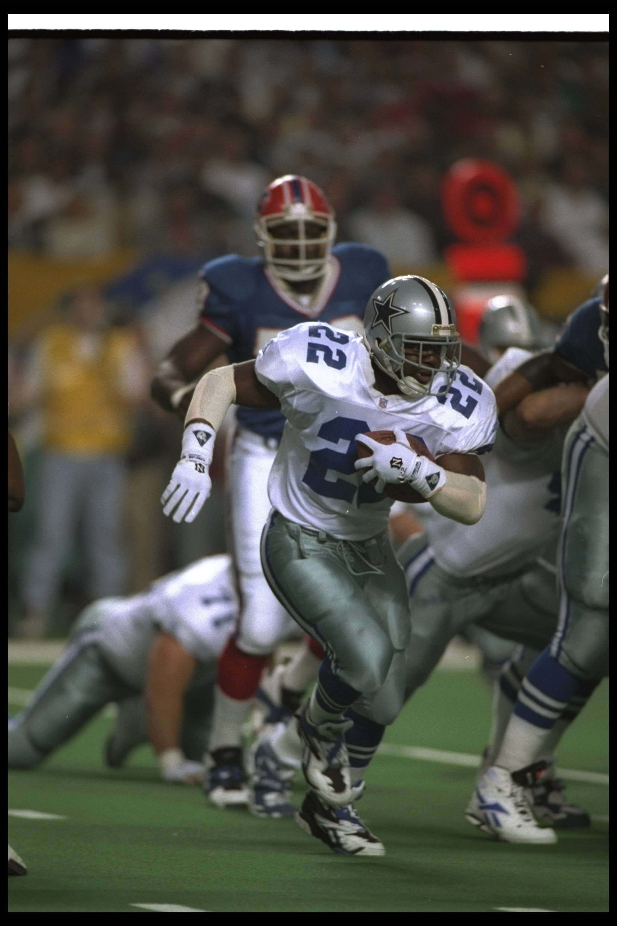 Buffalo Bills running back Thurman Thomas (34) fumbles the ball during the  third quarter of Super Bowl XXVIII against the Dallas Cowboys Jan. 30, 1994  at the Georgia Dome in Atlanta. Coming