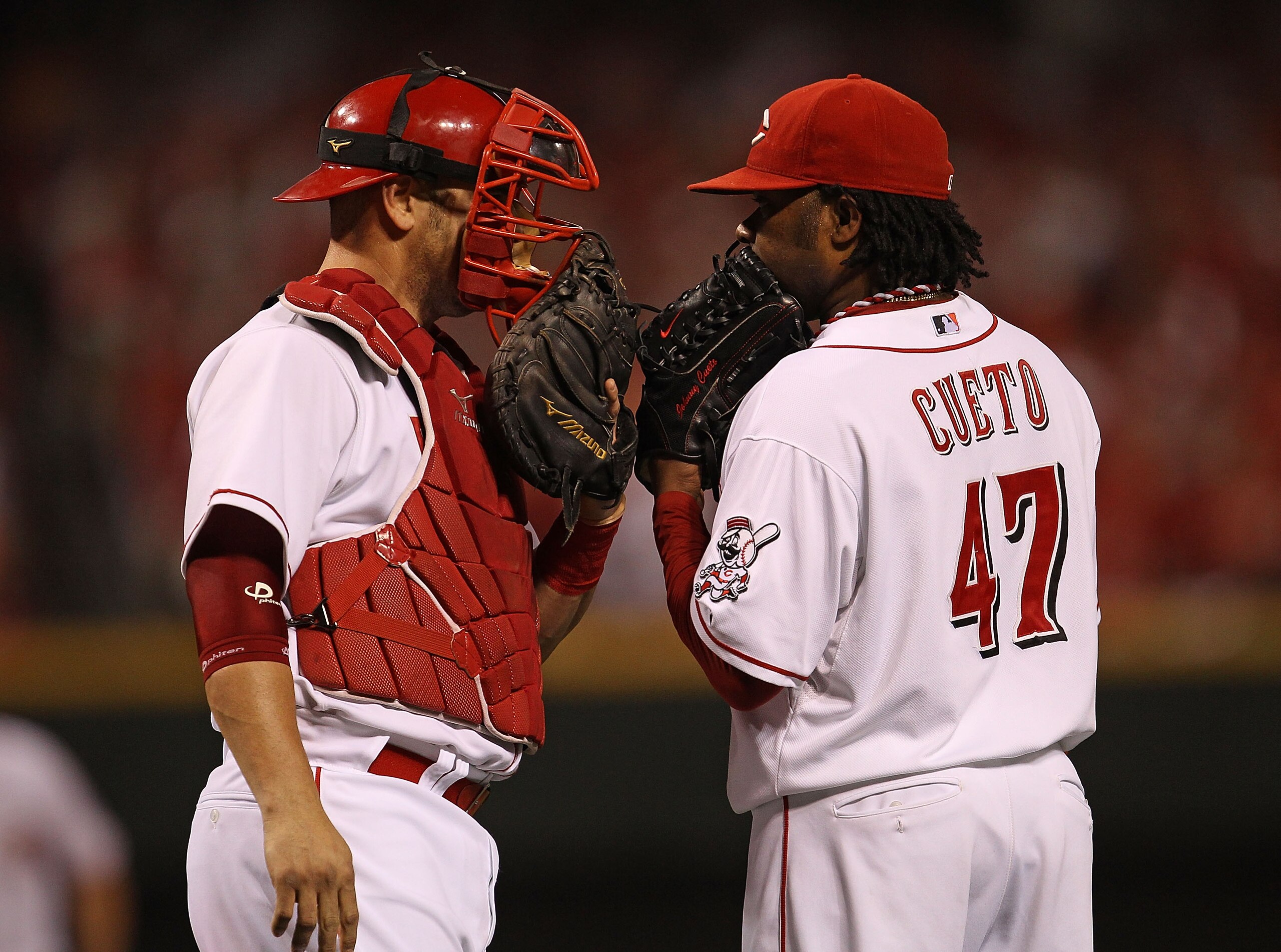 CINCINNATI - OCTOBER 10: Starting pitcher Johnny Cueto #47 of the Cincinnati Reds talks with catcher Ramon Hernandez #55 against the Philadelphia Phillies during game 3 of the NLDS at Great American Ball Park on October 10, 2010 in Cincinnati, Ohio. The P