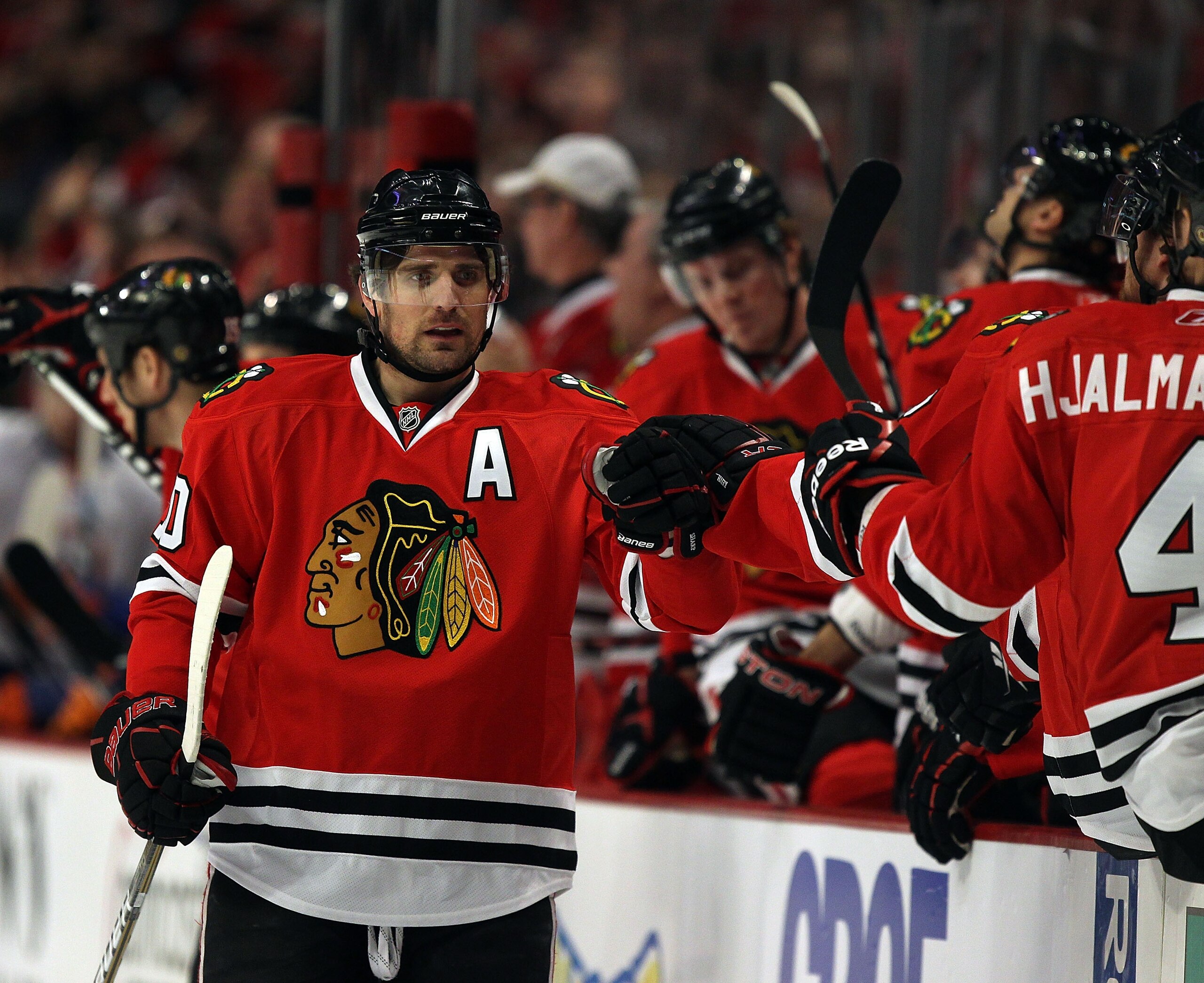 CHICAGO, IL - JANUARY 09: Patrick Sharp #10 of the Chicago Blackhawks is congratulated by teammates after scoring his 25th goal of the season against the New York Islanders at the United Center on January 9, 2011 in Chicago, Illinois. (Photo by Jonathan D CHICAGO, IL - JANUARY 09: Patrick Sharp #10 of the Chicago Blackhawks is congratulated by teammates after scoring his 25th goal of the season against the New York Islanders at the United Center on January 9, 2011 in Chicago, Illinois. (Photo by Jonathan D