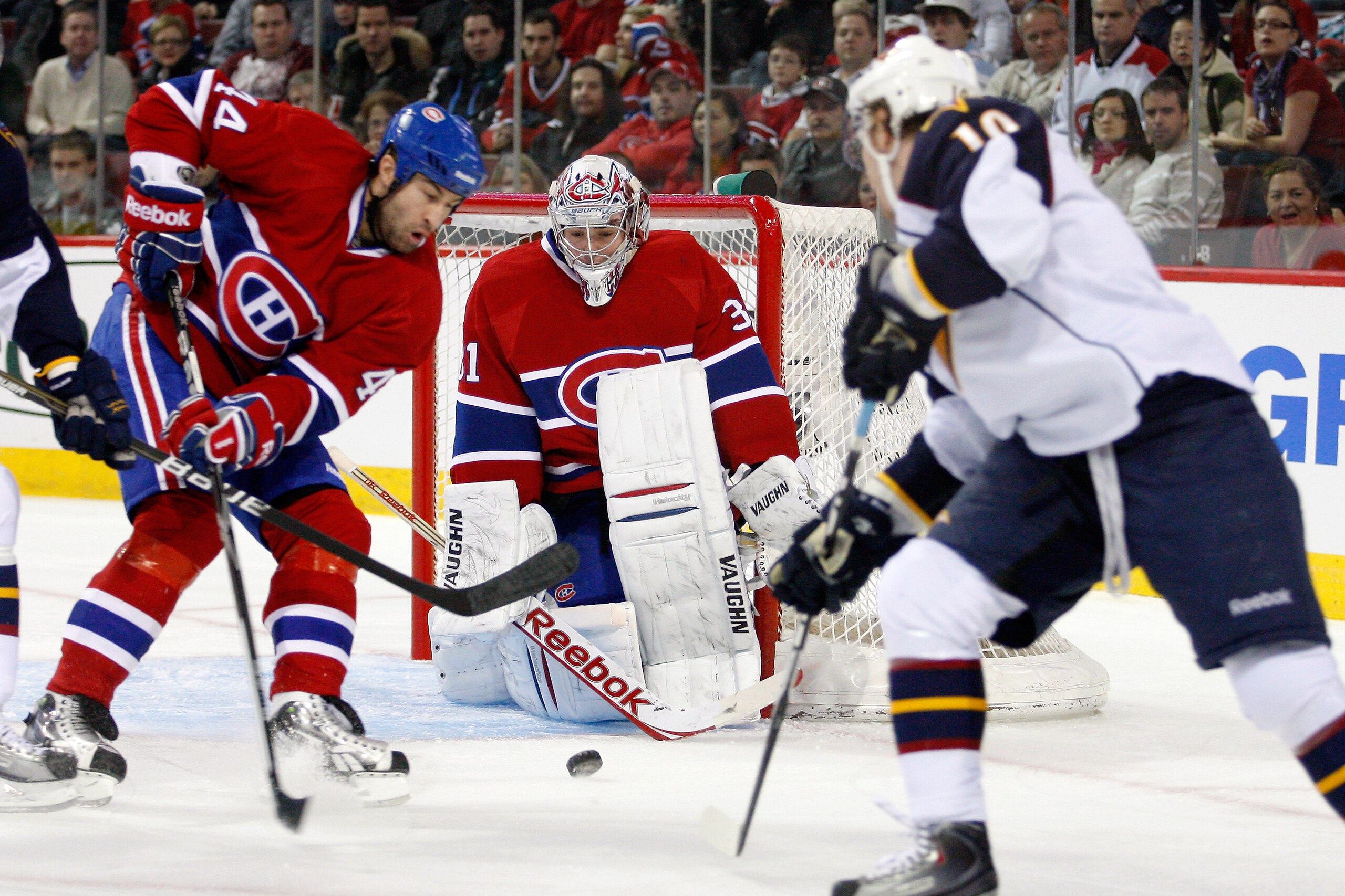 MONTREAL, CANADA - JANUARY 2: Carey Price #31 of the Montreal Canadiens gets down to stop the puck on a shot by Bryan Little #10 of the Atlanta Thrashers during the NHL game at the Bell Centre on January 2, 2011 in Montreal, Quebec, Canada. (Photo by Ri MONTREAL, CANADA - JANUARY 2: Carey Price #31 of the Montreal Canadiens gets down to stop the puck on a shot by Bryan Little #10 of the Atlanta Thrashers during the NHL game at the Bell Centre on January 2, 2011 in Montreal, Quebec, Canada. (Photo by Ri