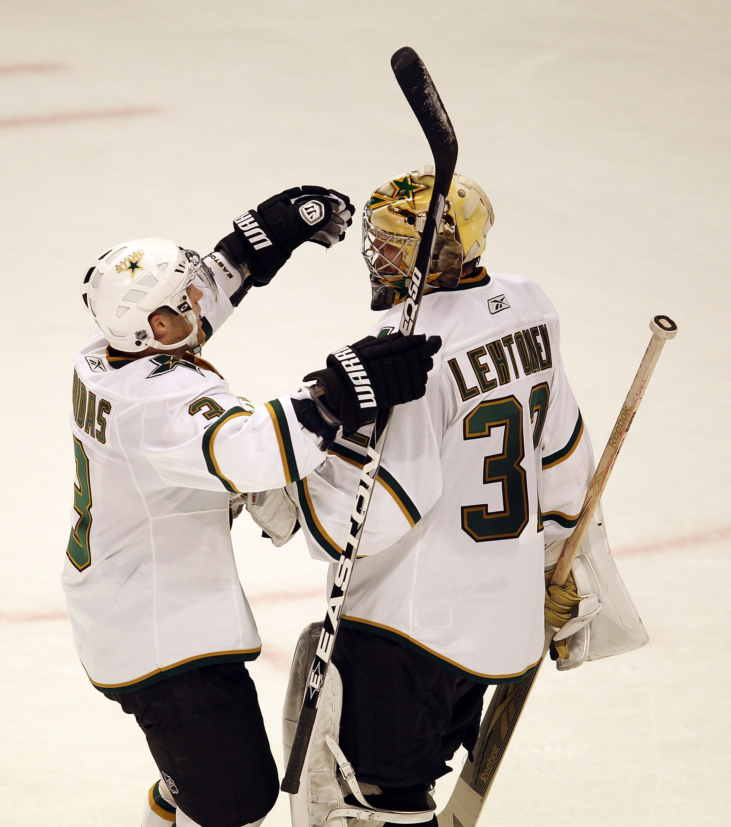 CHICAGO, IL - JANUARY 05: Stephane Robidas #3 of the Dallas Stars hugs teammate Kari Lehtonen #32 after a win over the Chicago Blackhawks at the United Center on January 5, 2011 in Chicago, Illinois. The Stars defeated the Blackhawks 4-2. (Photo by Jonath CHICAGO, IL - JANUARY 05: Stephane Robidas #3 of the Dallas Stars hugs teammate Kari Lehtonen #32 after a win over the Chicago Blackhawks at the United Center on January 5, 2011 in Chicago, Illinois. The Stars defeated the Blackhawks 4-2. (Photo by Jonath