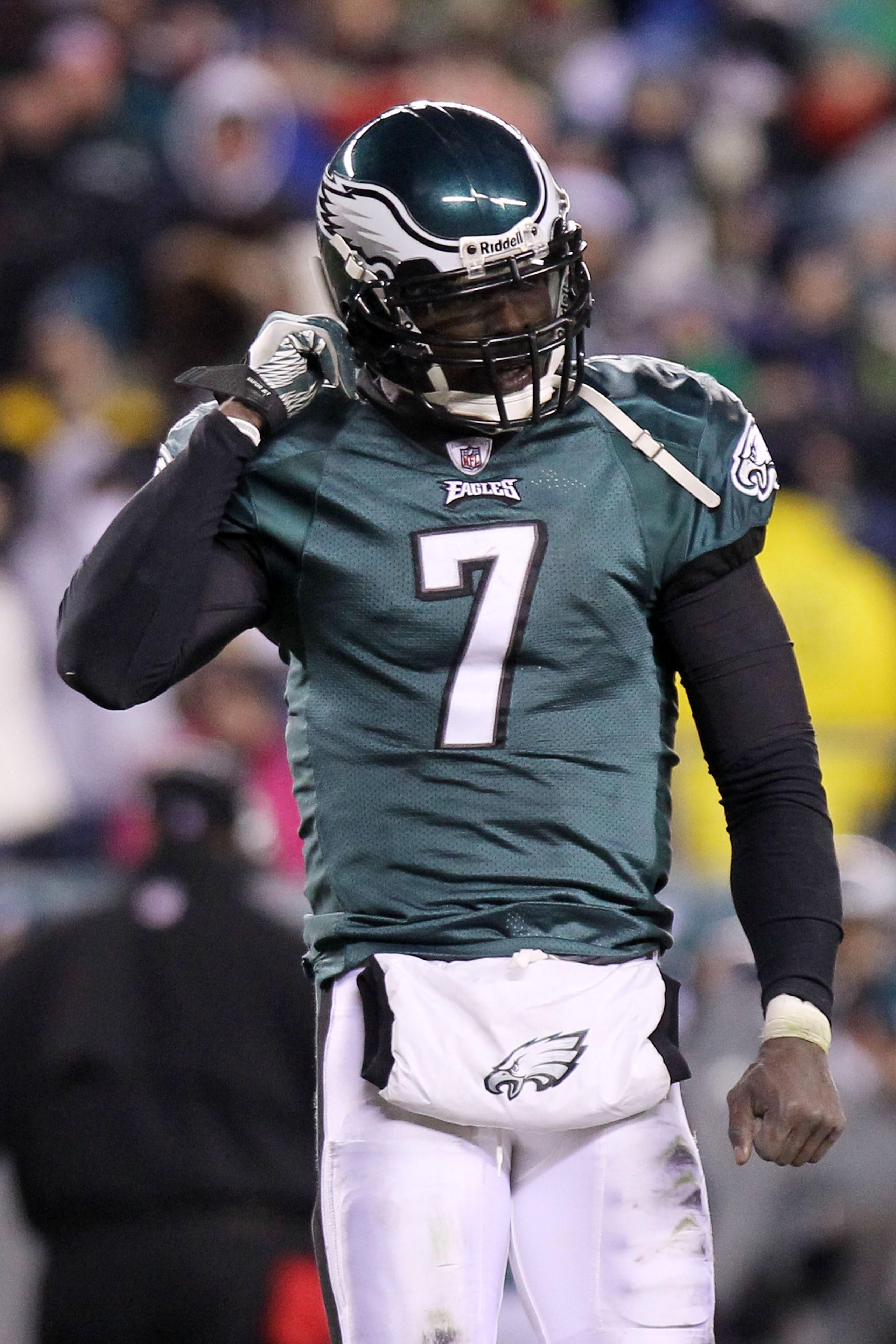 PHILADELPHIA, PA - JANUARY 09:  Michael Vick #7 of the Philadelphia Eagles reacts against the Green Bay Packers during the 2011 NFC wild card playoff game at Lincoln Financial Field on January 9, 2011 in Philadelphia, Pennsylvania.  (Photo by Nick Laham/G