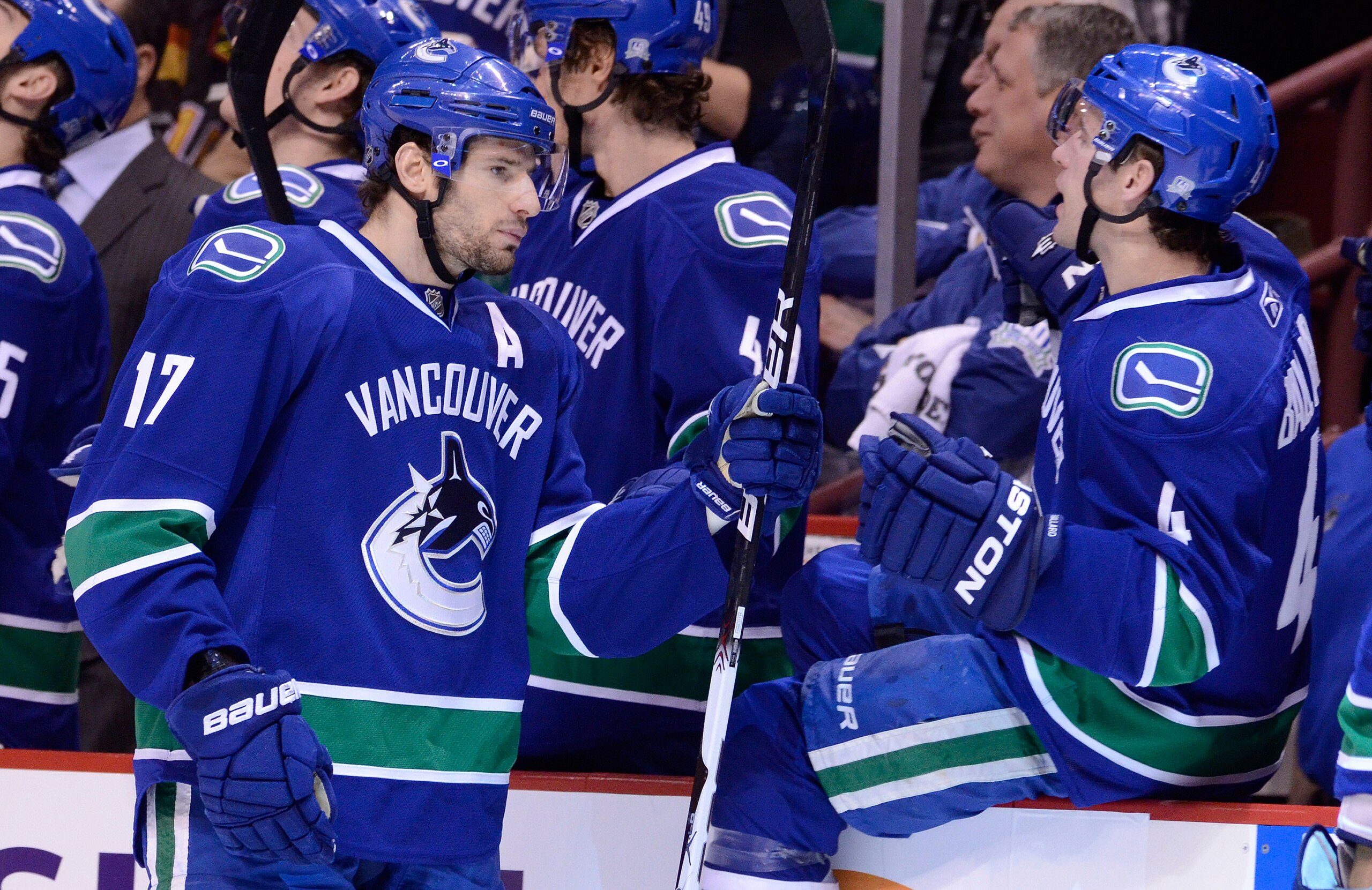 VANCOUVER, CANADA - JANUARY 5: Ryan Kesler #17 of the Vancouver Canucks is congratulated by Keith Ballard #4 after scoring against the Calgary Flames during the first period in NHL action on January 05, 2011 at Rogers Arena in Vancouver, BC, Canada. (Pho VANCOUVER, CANADA - JANUARY 5: Ryan Kesler #17 of the Vancouver Canucks is congratulated by Keith Ballard #4 after scoring against the Calgary Flames during the first period in NHL action on January 05, 2011 at Rogers Arena in Vancouver, BC, Canada. (Pho