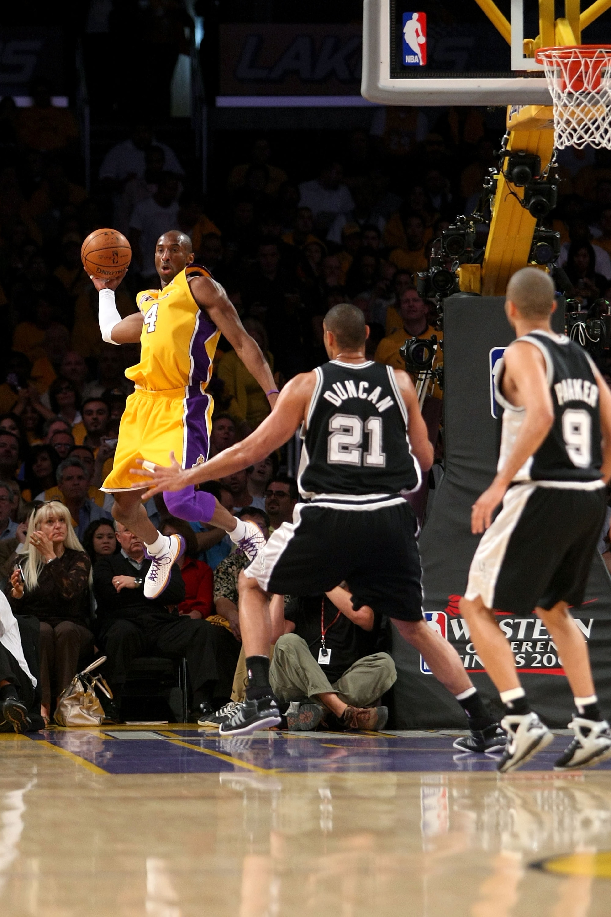 LOS ANGELES, CA - MAY 29: Kobe Bryant #24 of the Los Angeles Lakers looks to throw the ball inbounds over Tim Duncan #21 and Tony Parker #9 of the San Antonio Spurs in Game Five of the Western Conference Finals during the 2008 NBA Playoffs on May 29, 200 LOS ANGELES, CA - MAY 29: Kobe Bryant #24 of the Los Angeles Lakers looks to throw the ball inbounds over Tim Duncan #21 and Tony Parker #9 of the San Antonio Spurs in Game Five of the Western Conference Finals during the 2008 NBA Playoffs on May 29, 200