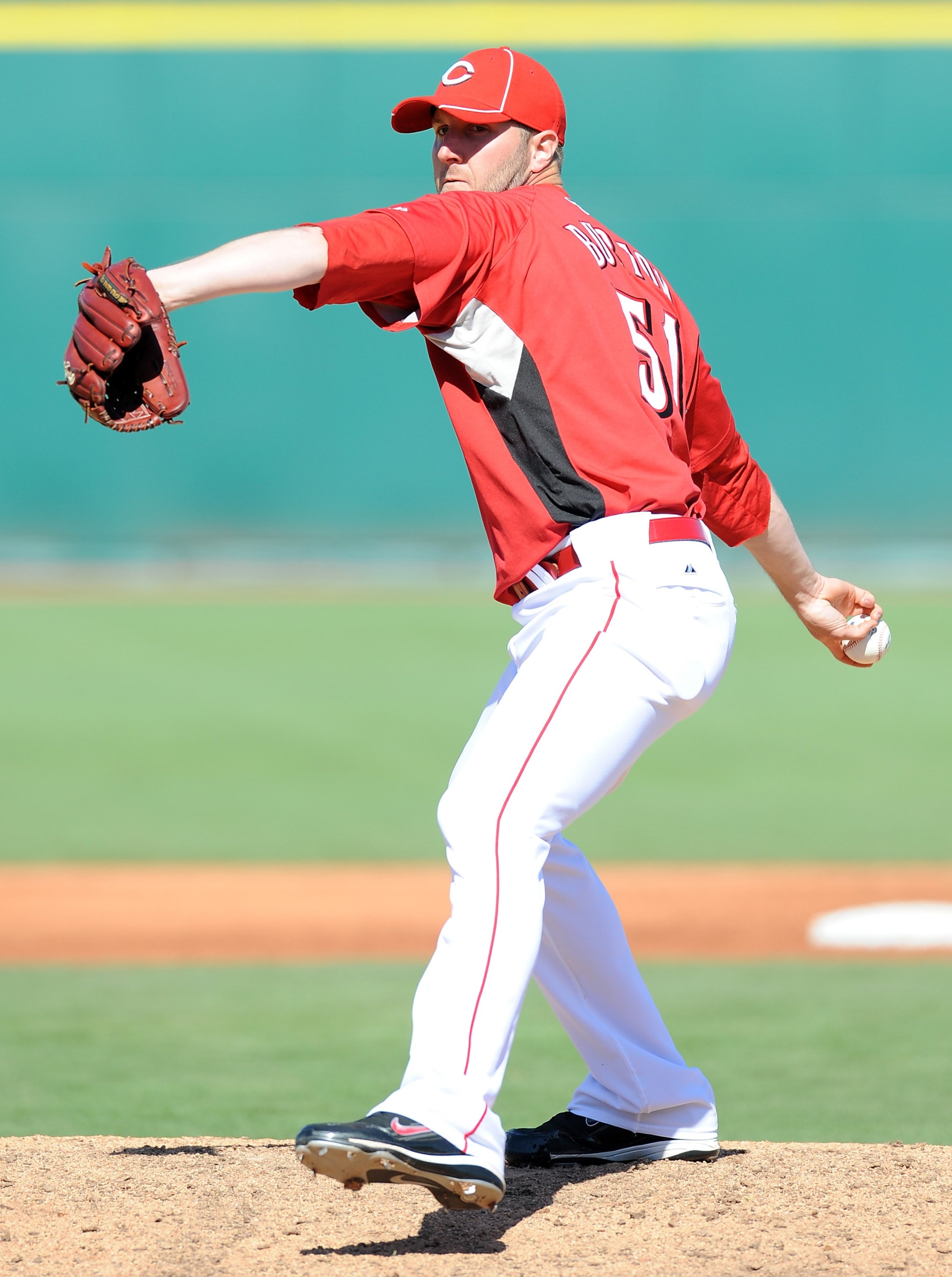 GOODYEAR, AZ - MARCH 11:  Jared Burton #51 of the Cincinnati Reds pitches during a Spring Training game against the Milwaukee Brewers on March 11, 2010 at Goodyear Ballpark in Goodyear, Arizona.  (Photo by Lisa Blumenfeld/Getty Images)
