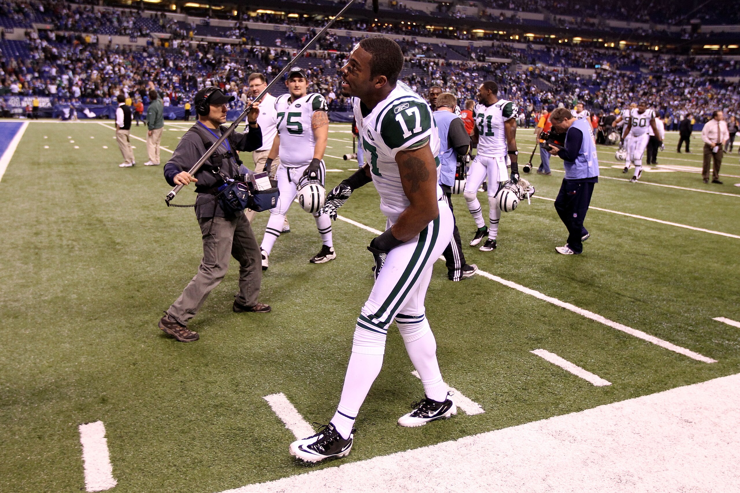 INDIANAPOLIS, IN - JANUARY 08:  Braylon Edwards #17 of the New York Jets celebrates after the Jets 17-16 win against the Indianapolis Colts during their 2011 AFC wild card playoff game at Lucas Oil Stadium on January 8, 2011 in Indianapolis, Indiana.  (Ph