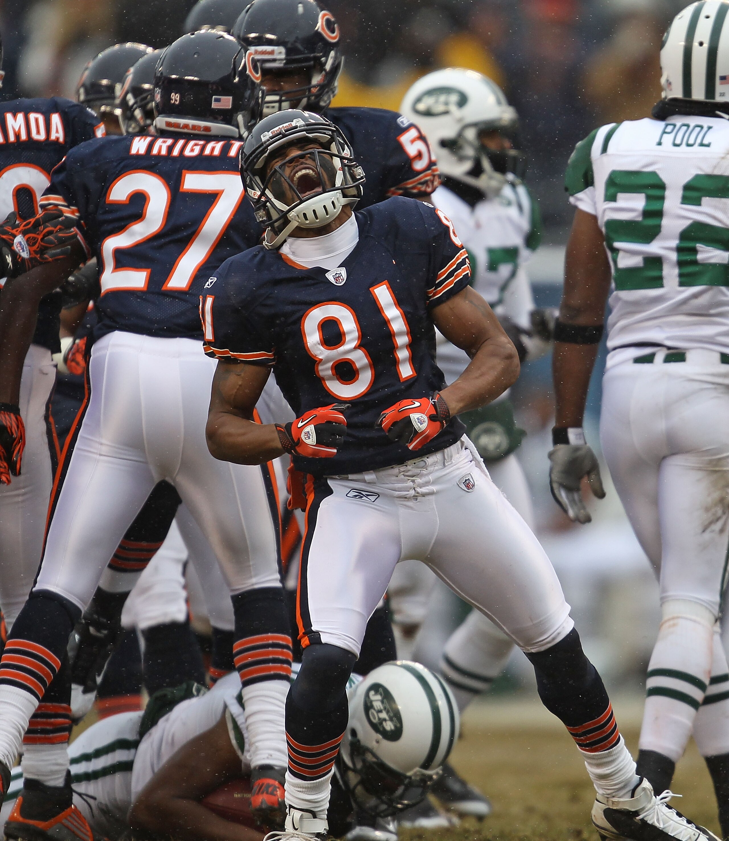 CHICAGO, IL - DECEMBER 26: Rashied Davis #81 of the Chicago Bears celebrates a special team tackle against the New York Jets at Soldier Field on December 26, 2010 in Chicago, Illinois. The Bears defeated the Jets 38-34. (Photo by Jonathan Daniel/Getty Ima CHICAGO, IL - DECEMBER 26: Rashied Davis #81 of the Chicago Bears celebrates a special team tackle against the New York Jets at Soldier Field on December 26, 2010 in Chicago, Illinois. The Bears defeated the Jets 38-34. (Photo by Jonathan Daniel/Getty Ima