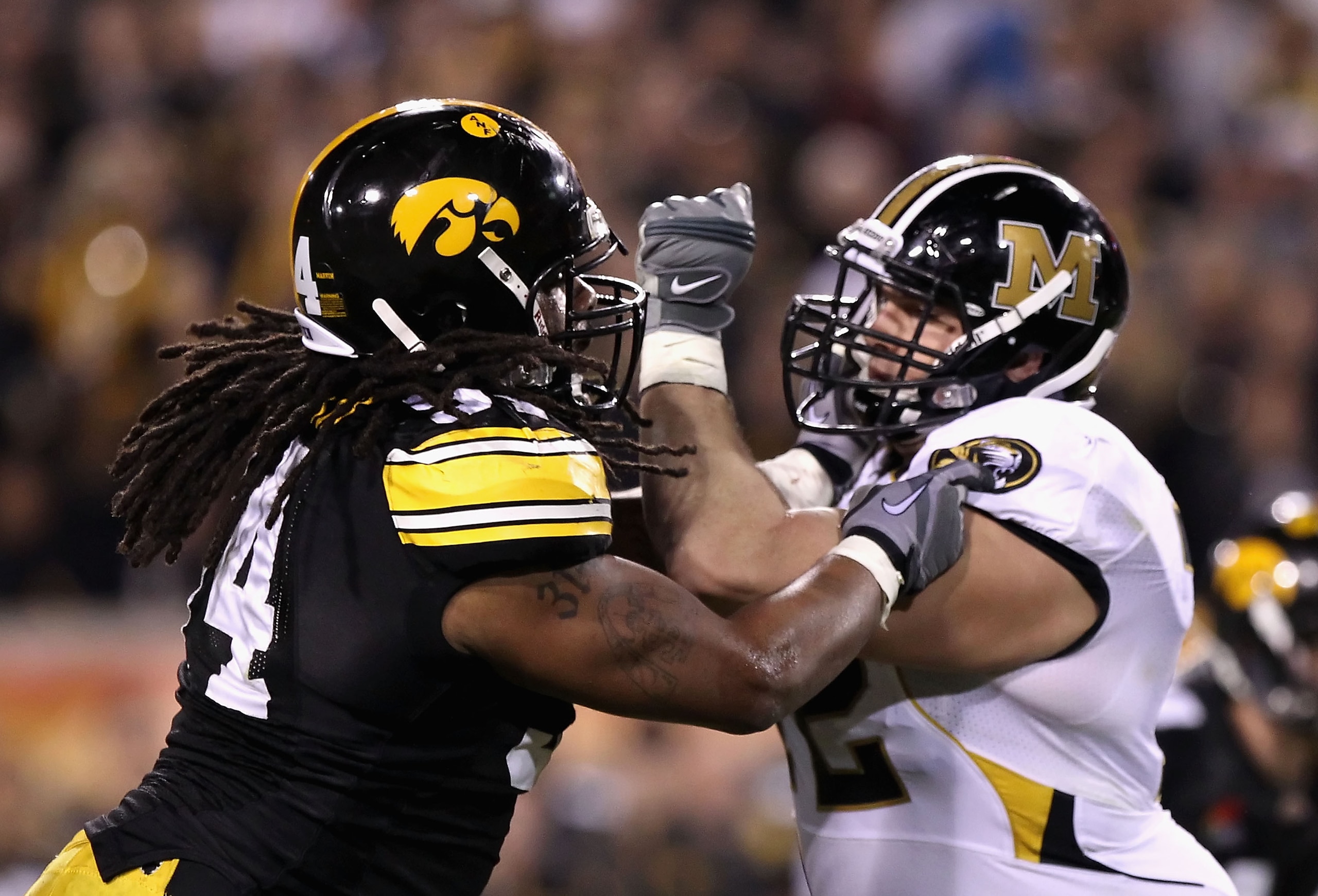 TEMPE, AZ - DECEMBER 28: Defensive end Adrian Clayborn #94 of the Iowa Hawkeyes in action during the Insight Bowl against the Missouri Tigers at Sun Devil Stadium on December 28, 2010 in Tempe, Arizona. The Hawkeyes defeated the Tigers 27-24. (Photo by TEMPE, AZ - DECEMBER 28: Defensive end Adrian Clayborn #94 of the Iowa Hawkeyes in action during the Insight Bowl against the Missouri Tigers at Sun Devil Stadium on December 28, 2010 in Tempe, Arizona. The Hawkeyes defeated the Tigers 27-24. (Photo by