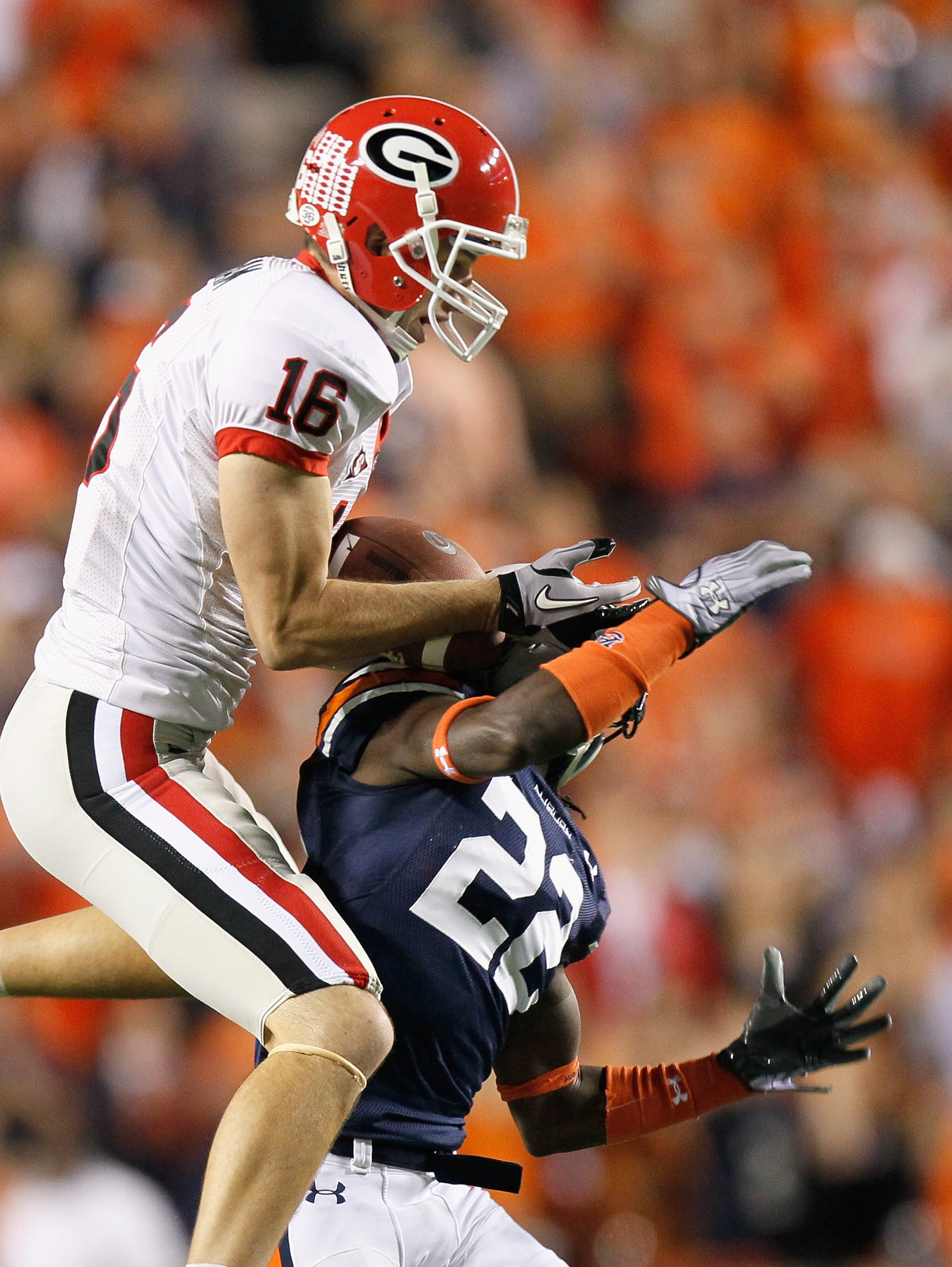 AUBURN, AL - NOVEMBER 13:  Kris Durham #16 of the Georgia Bulldogs pulls in this reception against T'Sharvan Bell #22 of the Auburn Tigers at Jordan-Hare Stadium on November 13, 2010 in Auburn, Alabama.  (Photo by Kevin C. Cox/Getty Images)