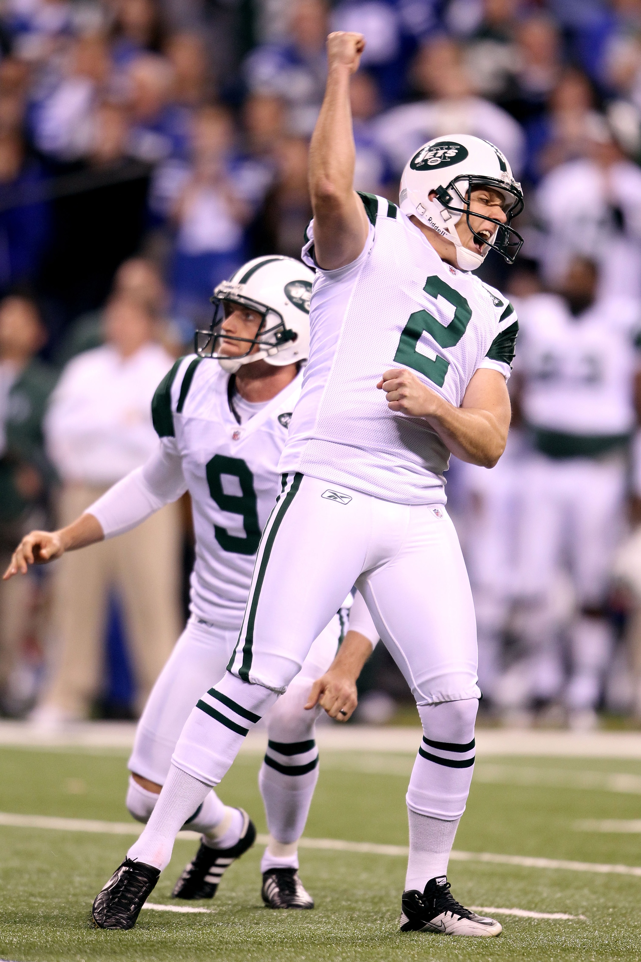 INDIANAPOLIS, IN - JANUARY 08: Place kicker Nick Folk #2 and Steve Weatherford #9 of the New York Jets celebrates after Folk successfully kicked a game-winning a 32-yard field goal in the fourth quarter to win 17-16 against the Indianapolis Colts during INDIANAPOLIS, IN - JANUARY 08: Place kicker Nick Folk #2 and Steve Weatherford #9 of the New York Jets celebrates after Folk successfully kicked a game-winning a 32-yard field goal in the fourth quarter to win 17-16 against the Indianapolis Colts during