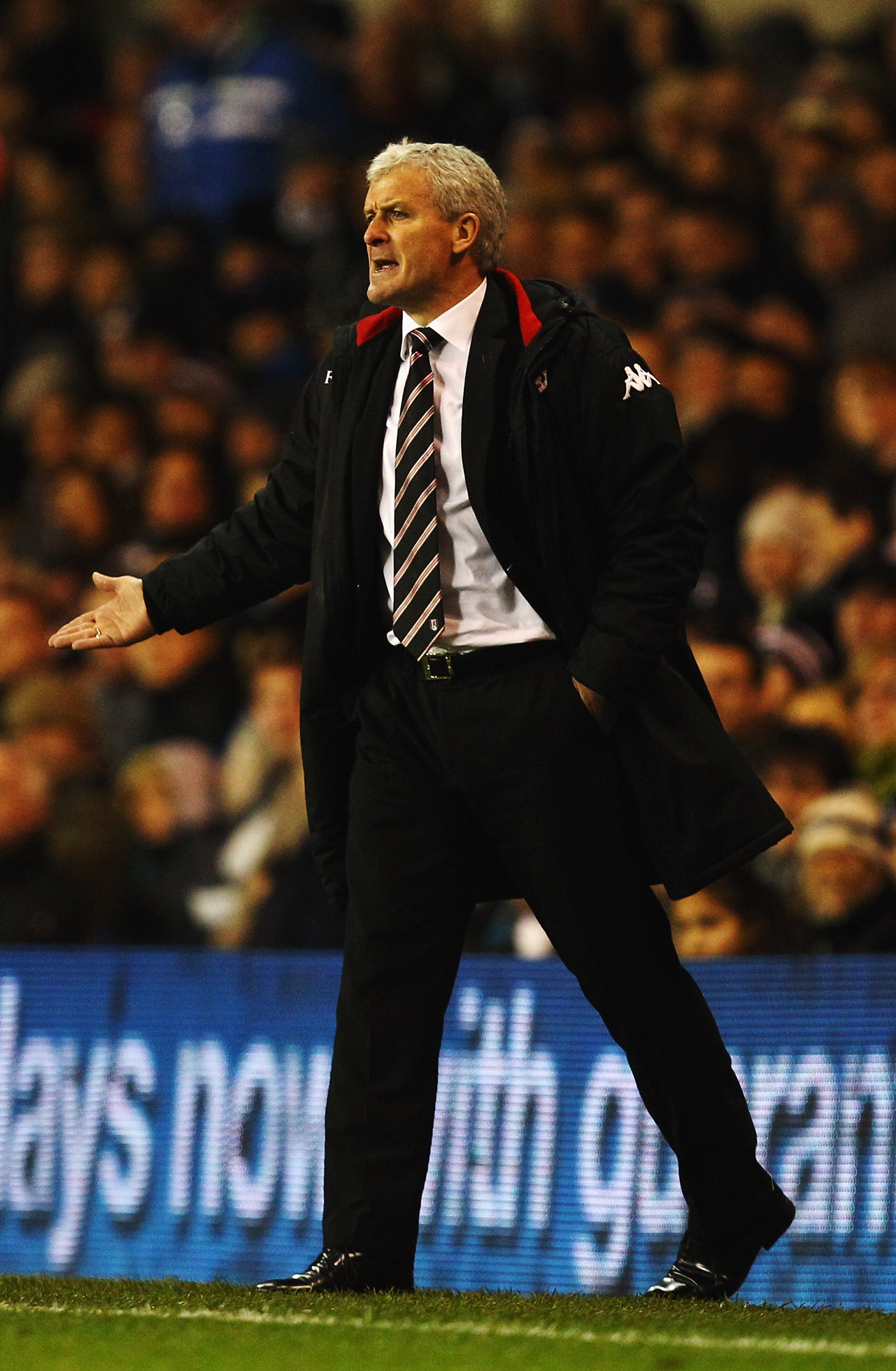 LONDON, UNITED KINGDOM - JANUARY 01:  Mark Hughes the Fulham manager shouts instructions from the touchline during the Barclays Premier League match between Tottenham Hotspur and Fulham at White Hart Lane on January 1, 2011 in London, England.  (Photo by