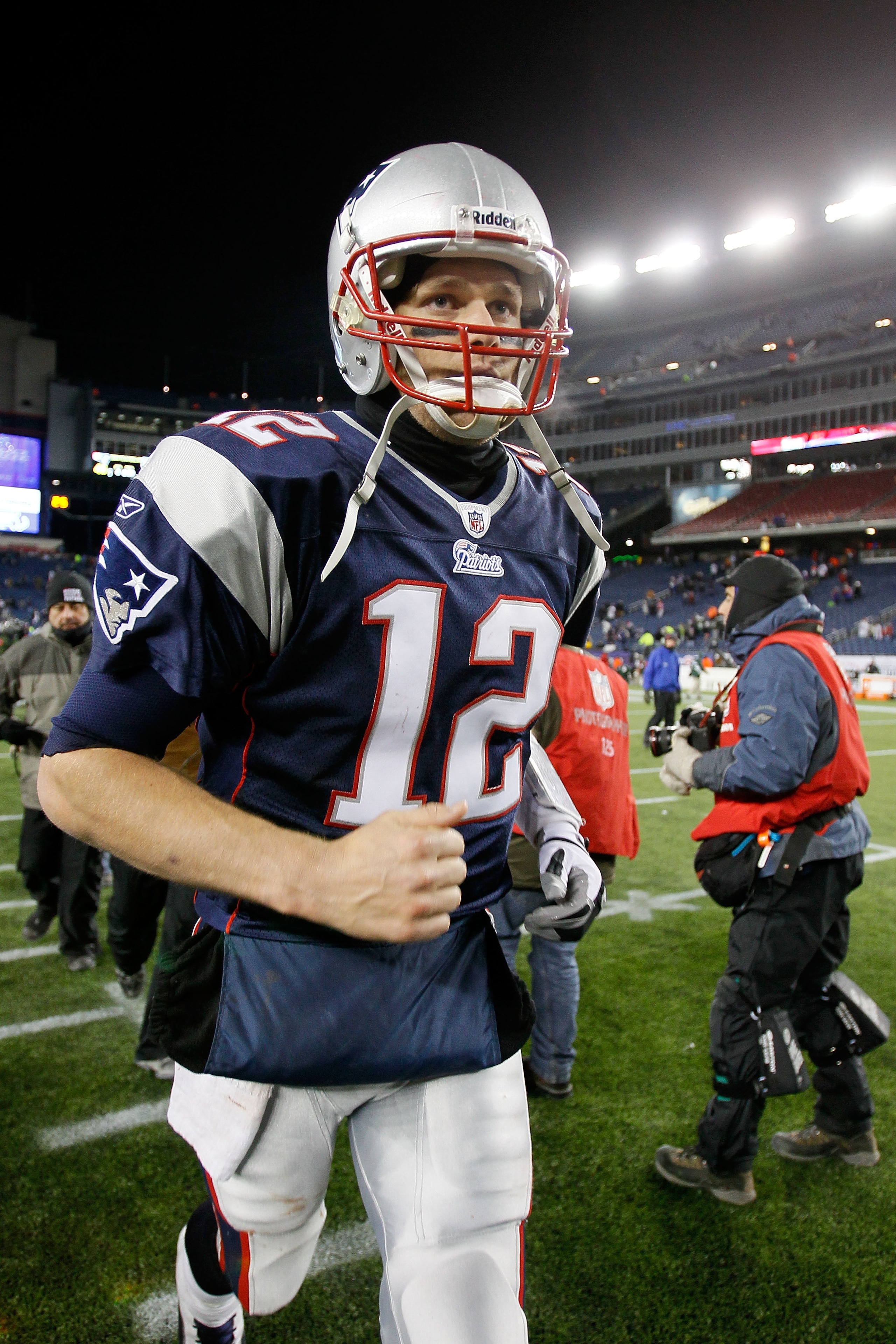 FOXBORO, MA - DECEMBER 06: Tom Brady #12 of the New England Patriots runs off the field after the Patriots won 45-3 against the New York Jets at Gillette Stadium on December 6, 2010 in Foxboro, Massachusetts. (Photo by Jim Rogash/Getty Images) FOXBORO, MA - DECEMBER 06: Tom Brady #12 of the New England Patriots runs off the field after the Patriots won 45-3 against the New York Jets at Gillette Stadium on December 6, 2010 in Foxboro, Massachusetts. (Photo by Jim Rogash/Getty Images)