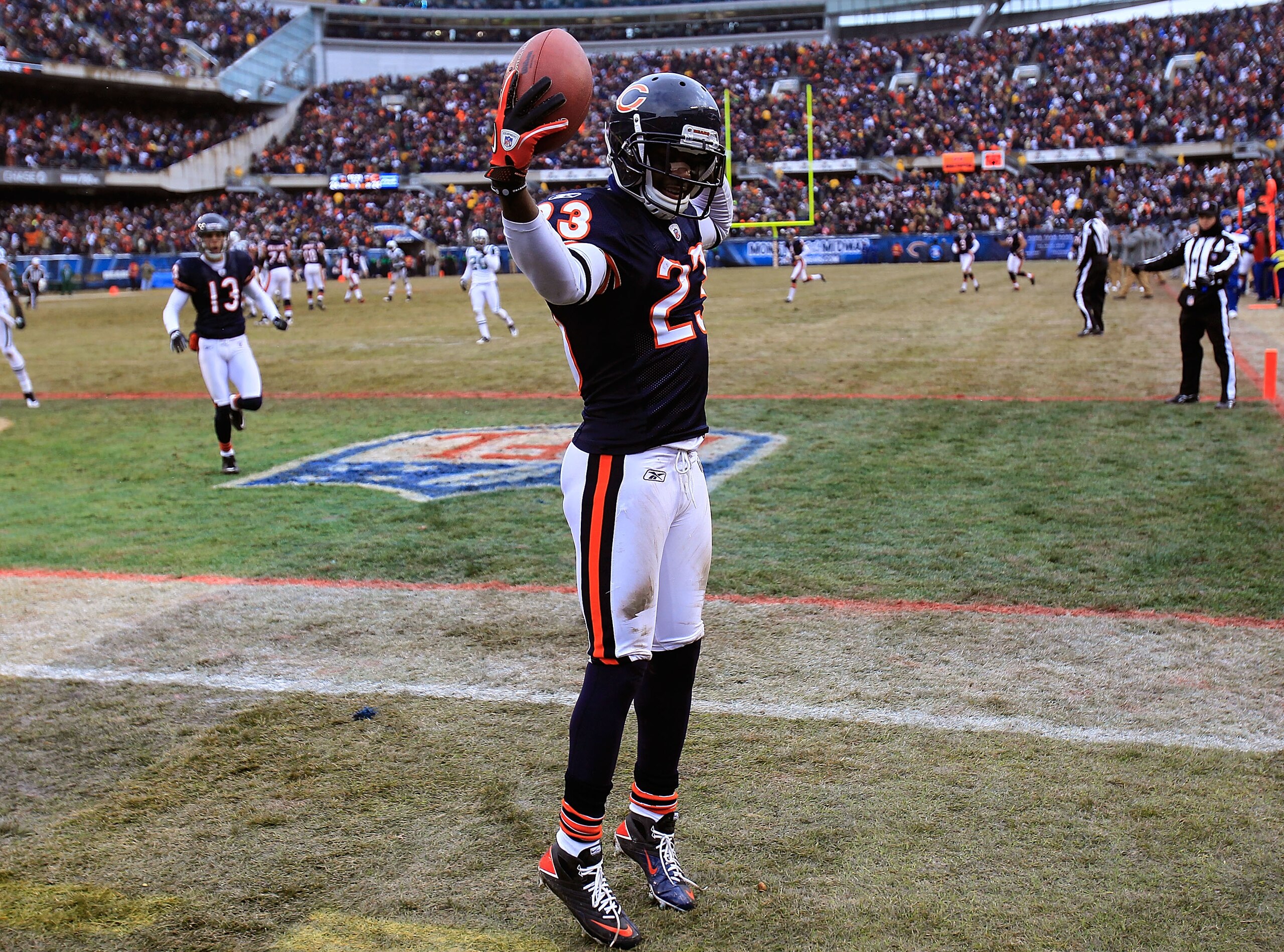 CHICAGO, IL - DECEMBER 26: Devin Hester #23 of the Chicago Bears celebrates a touchdown catch against the New York Jets at Soldier Field on December 26, 2010 in Chicago, Illinois. The Bears defeated the Jets 38-34. (Photo by Jonathan Daniel/Getty Images)