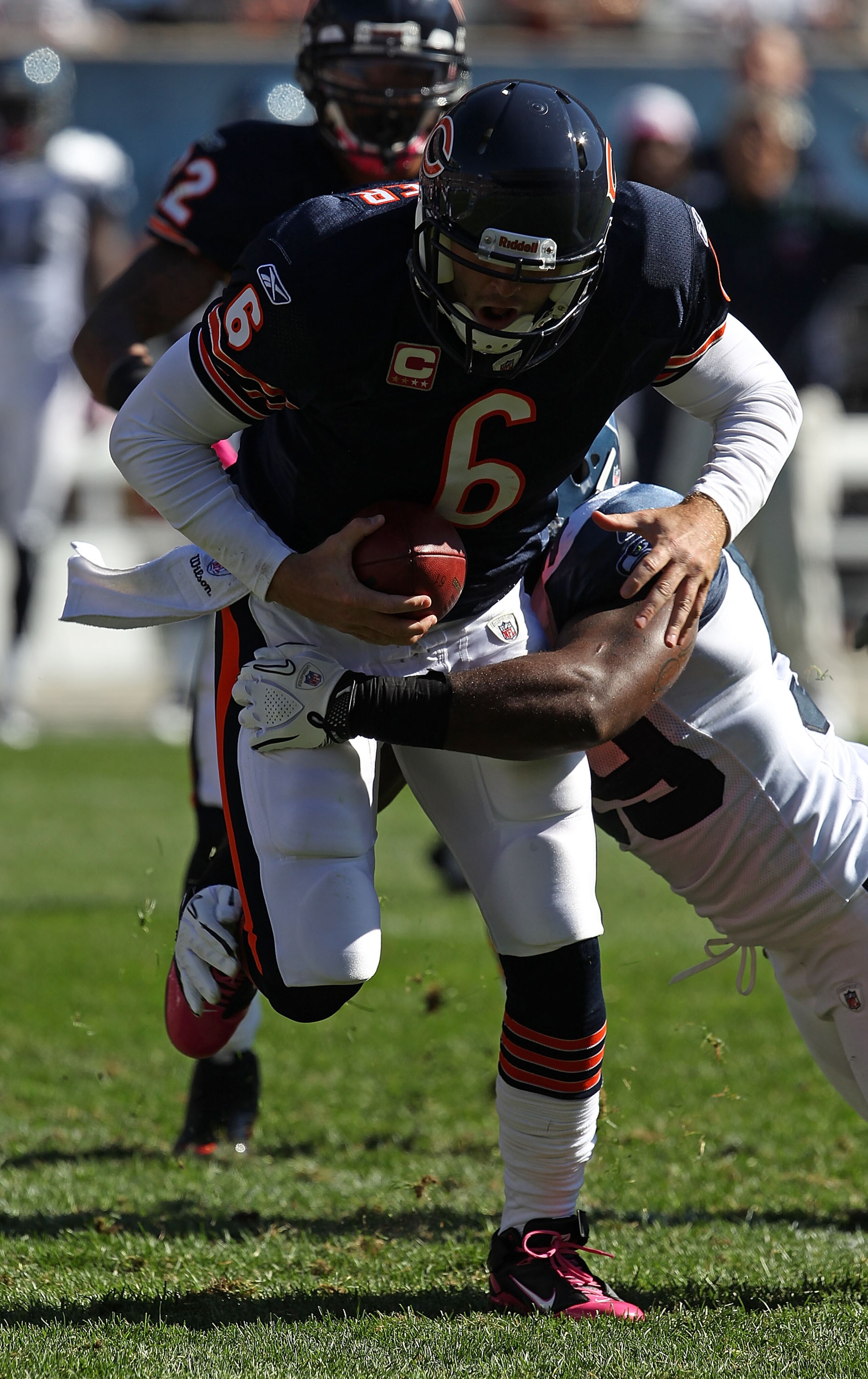 CHICAGO - OCTOBER 17: Jay Cutler #6 of the Chicago Bears is sacked by Aaron Curry #59 of the Seattle Seahawks at Soldier Field on October 17, 2010 in Chicago, Illinois. The Seahawks defeated the Bears 23-20. (Photo by Jonathan Daniel/Getty Images)