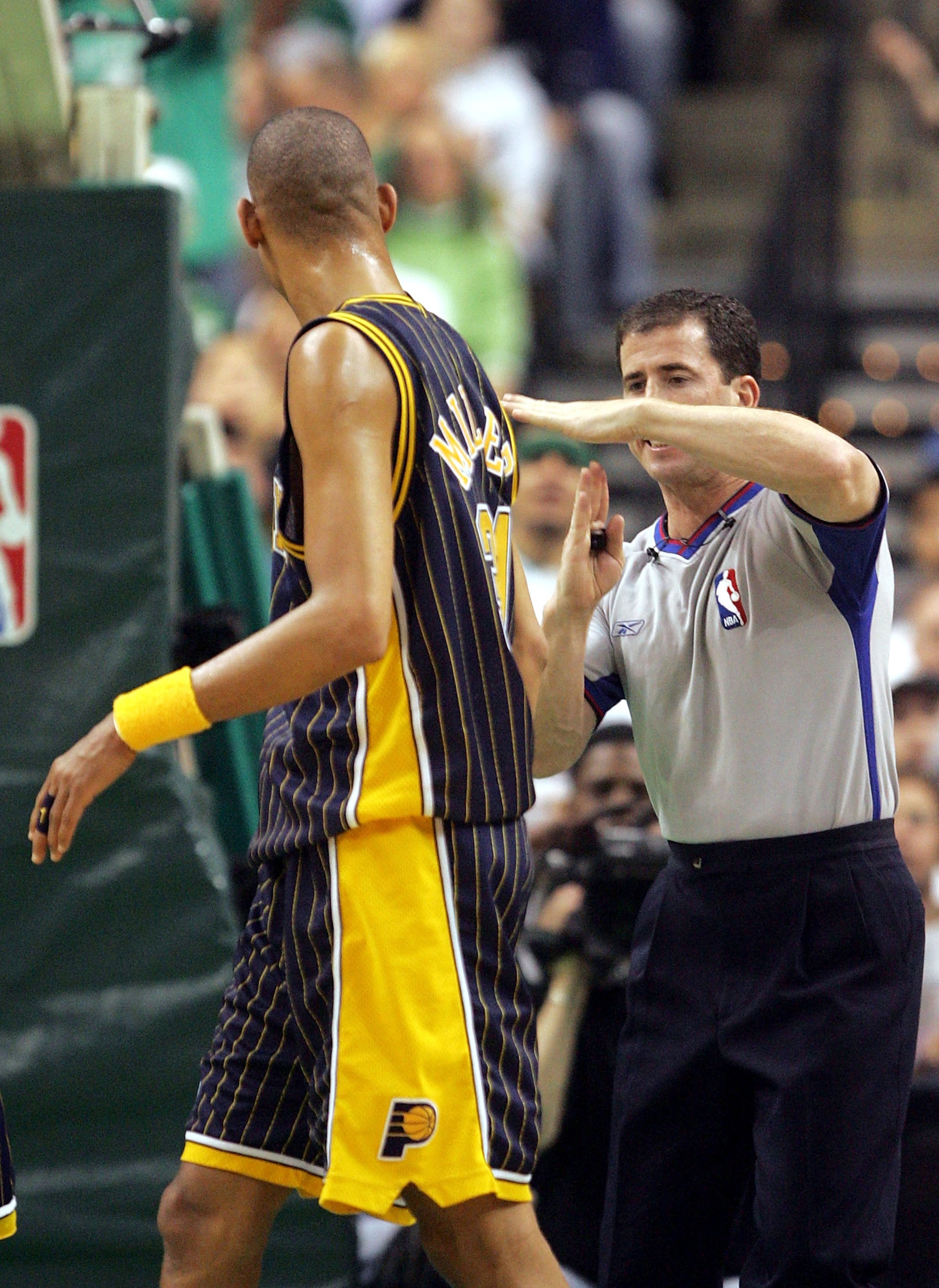 BOSTON - APRIL 23:  Referee Tim Donaghy #21 calls a technical foul on Reggie Miller #31 of the Indiana Pacers in Game one of the Eastern Conference Quarterfinals against the Boston Celtics during the 2005 NBA Playoffs at Fleet Center on April 23, 2005 in