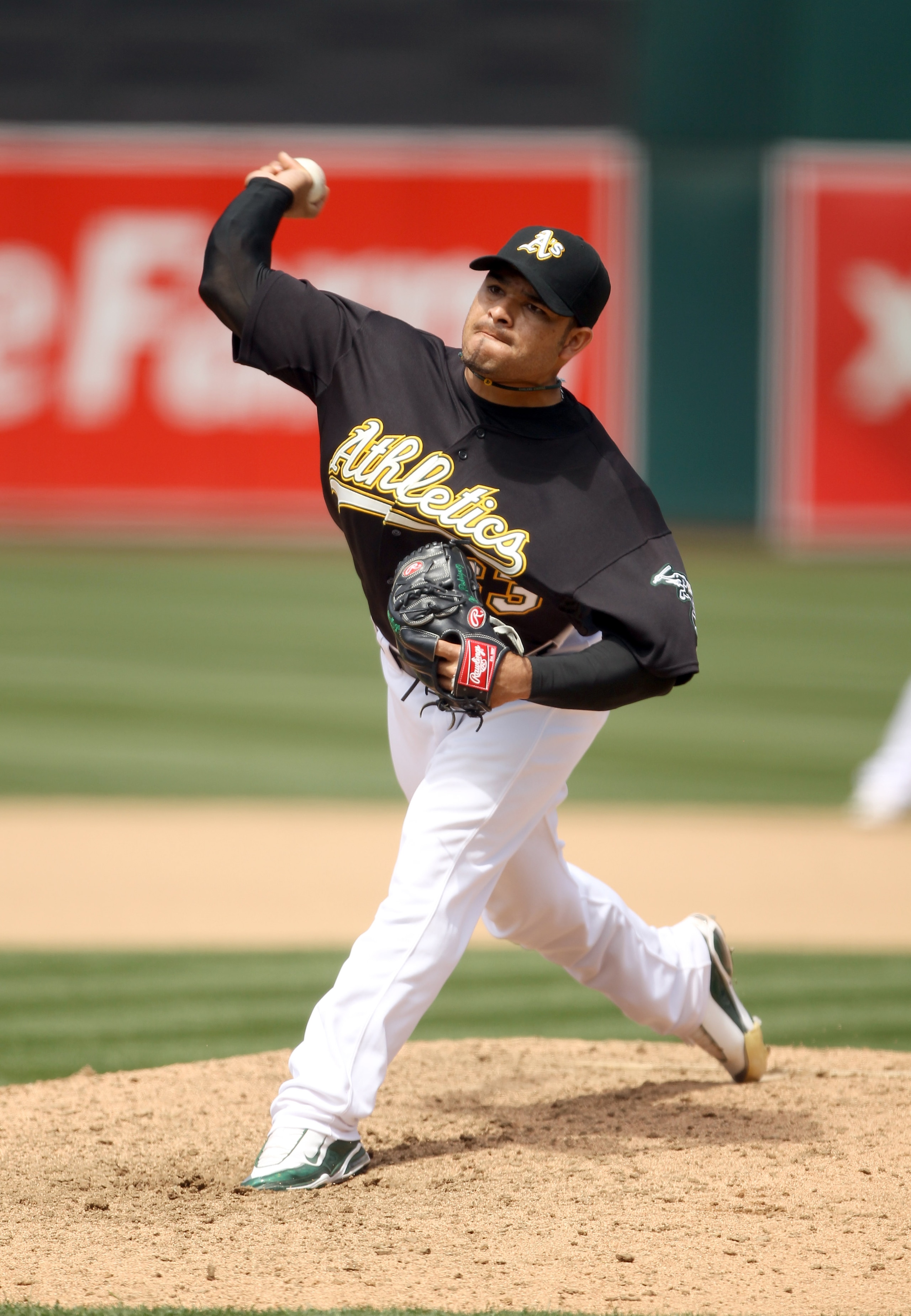 OAKLAND, CA - JULY 21: Henry Rodriguez #63 of the Oakland Athletics pitches against the Boston Red Sox at the Oakland-Alameda County Coliseum on July 21, 2010 in Oakland, California. (Photo by Ezra Shaw/Getty Images) OAKLAND, CA - JULY 21: Henry Rodriguez #63 of the Oakland Athletics pitches against the Boston Red Sox at the Oakland-Alameda County Coliseum on July 21, 2010 in Oakland, California. (Photo by Ezra Shaw/Getty Images)