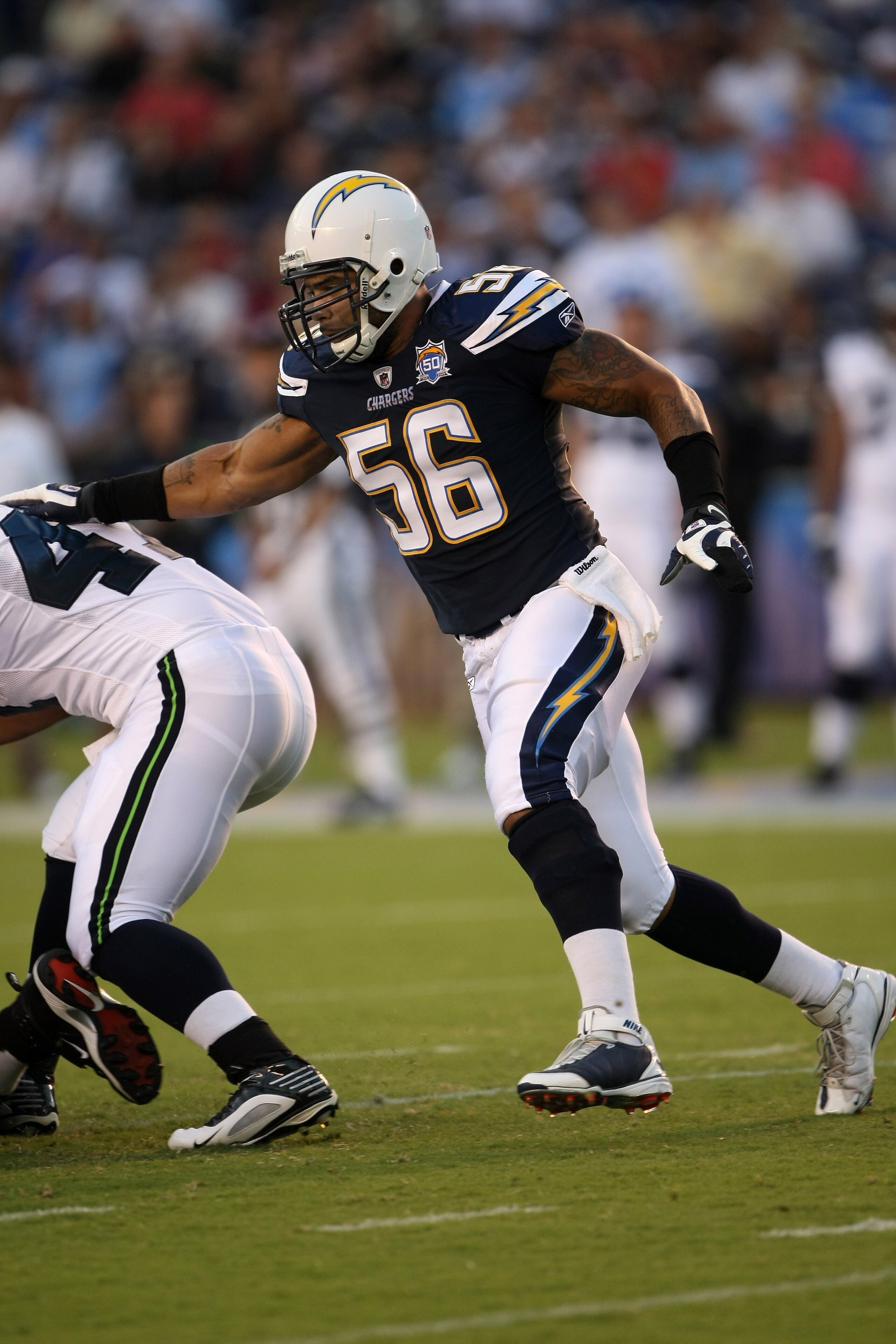 SAN DIEGO - AUGUST 15: Linebacker Shawne Merriman #56 of the San Diego Chargers pursues the ball against the Seattle Seahawks on August 15, 2009 at Qualcomm Stadium in San Diego, California. (Photo by Stephen Dunn/Getty Images) SAN DIEGO - AUGUST 15: Linebacker Shawne Merriman #56 of the San Diego Chargers pursues the ball against the Seattle Seahawks on August 15, 2009 at Qualcomm Stadium in San Diego, California. (Photo by Stephen Dunn/Getty Images)