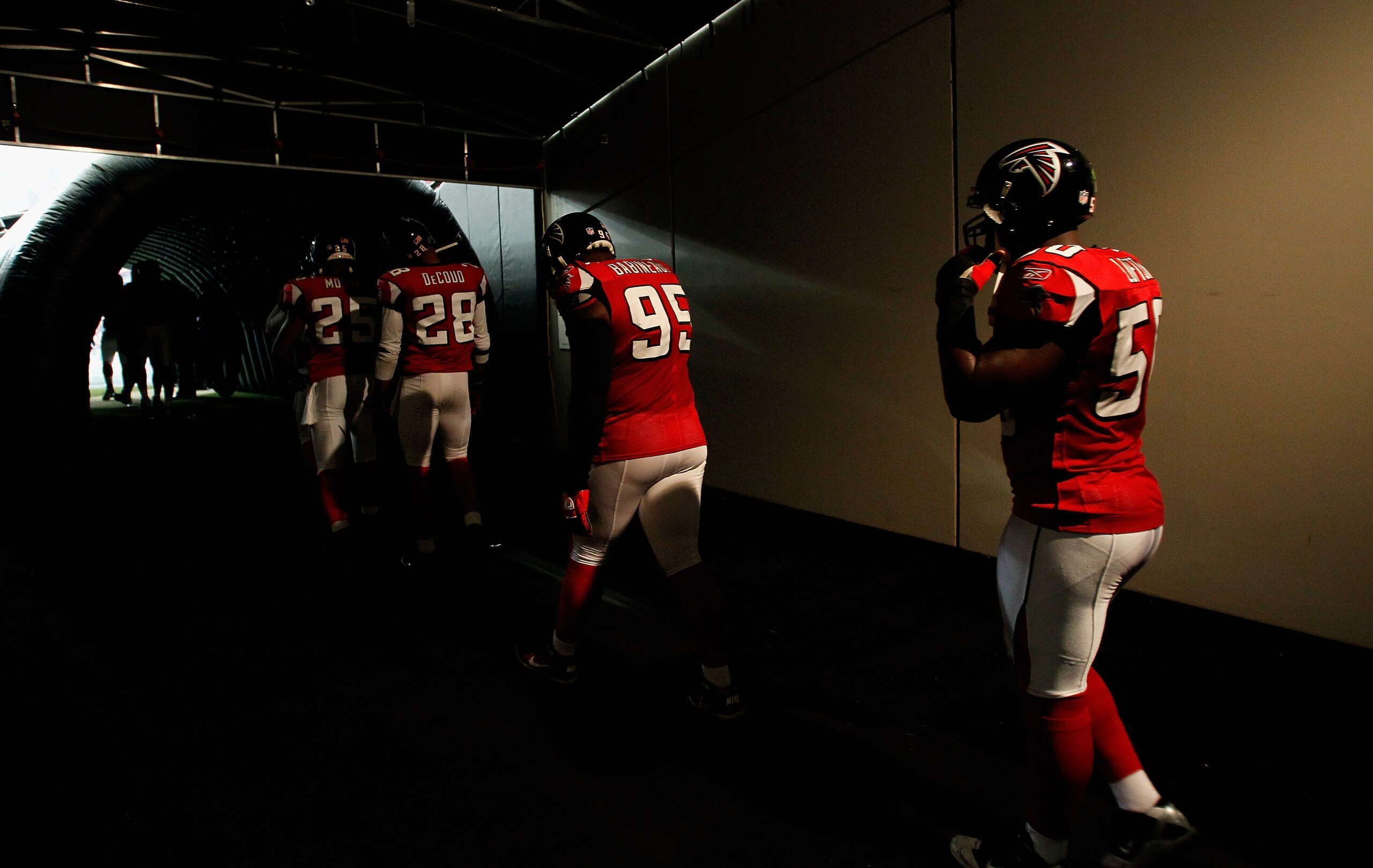 ATLANTA, GA - JANUARY 02:  The Atlanta Falcons defense enters the field to face the Carolina Panthers at Georgia Dome on January 2, 2011 in Atlanta, Georgia.  (Photo by Kevin C. Cox/Getty Images)