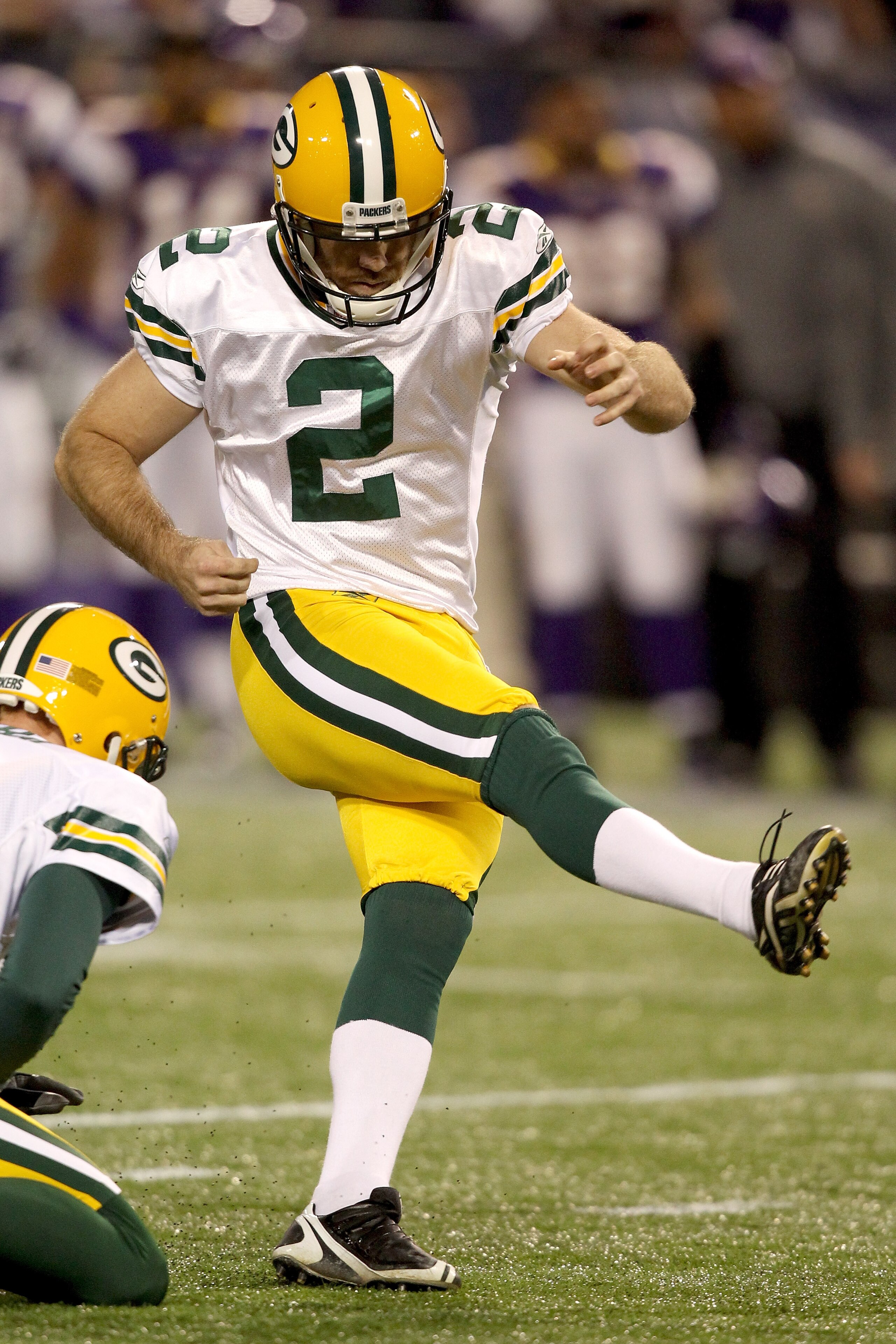 MINNEAPOLIS - NOVEMBER 21: Mason Crosby #2 of the Green Bay Packers kicks a field goal against the Minnesota Vikings at the Hubert H. Humphrey Metrodome on November 21, 2010 in Minneapolis, Minnesota.  (Photo by Matthew Stockman/Getty Images)