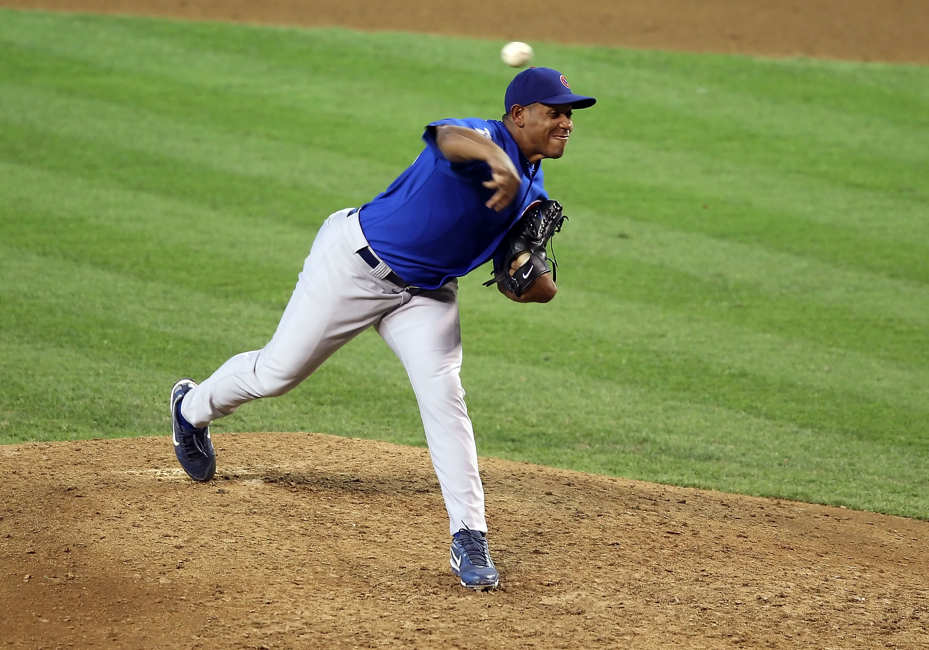 PHOENIX - JULY 05: Relief pitcher Carlos Marmol #49 of the Chicago Cubs pitches during the Major League Baseball game against the Arizona Diamondbacks at Chase Field on July 5, 2010 in Phoenix, Arizona. The Cubs defeated the Diamondbacks 9-4. (Photo by