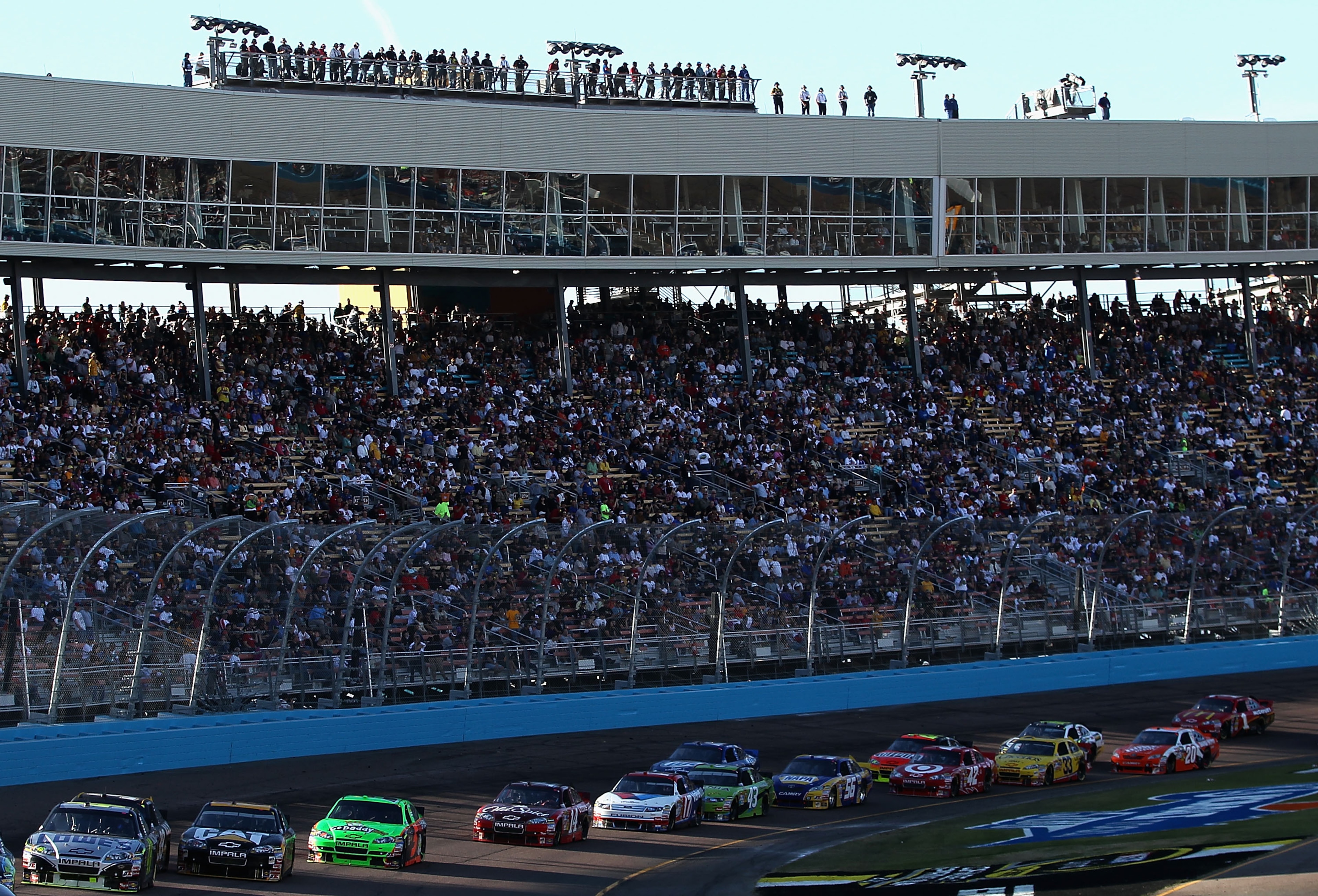 AVONDALE, AZ - NOVEMBER 14: Jimmie Johnson, driver of the #48 Lowe's Chevrolet, leads a pack of cars during the NASCAR Sprint Cup Series Kobalt Tools 500 at Phoenix International Raceway on November 14, 2010 in Avondale, Arizona. (Photo by Christian Pet AVONDALE, AZ - NOVEMBER 14: Jimmie Johnson, driver of the #48 Lowe's Chevrolet, leads a pack of cars during the NASCAR Sprint Cup Series Kobalt Tools 500 at Phoenix International Raceway on November 14, 2010 in Avondale, Arizona. (Photo by Christian Pet