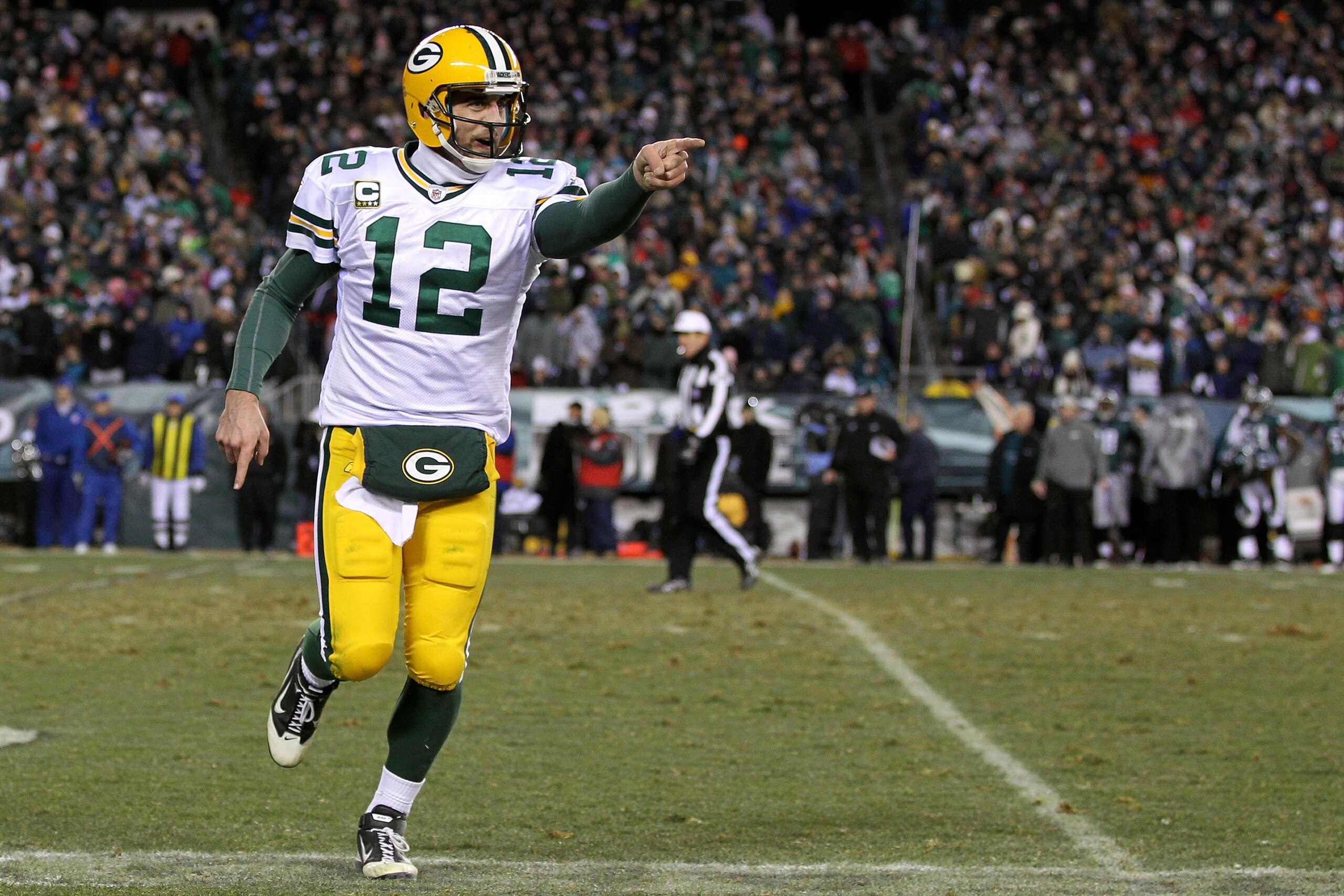 PHILADELPHIA, PA - JANUARY 09:  Aaron Rodgers #12 of the Green Bay Packers celebrates after a touchdown in the third quarter against the Philadelphia Eagles during the 2011 NFC wild card playoff game at Lincoln Financial Field on January 9, 2011 in Philad