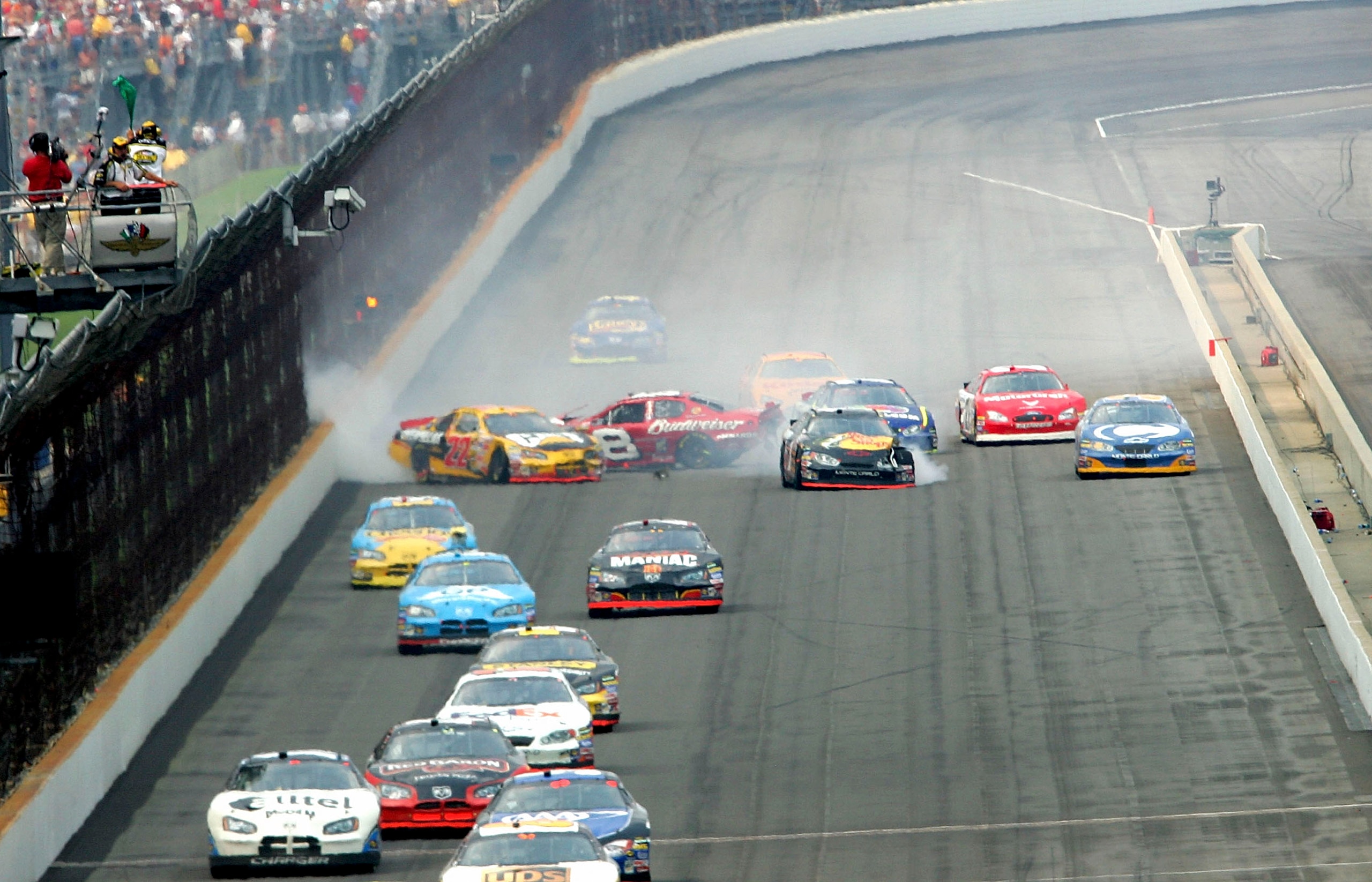 INDIANAPOLIS - AUGUST 7: Scott Wimmer, driver of the #22 Caterpillar Dodge, crashes into Dale Earnhardt Jr., driver of the #8 Budweiser Chevrolet during the NASCAR Nextel Cup Allstate 400 at the Brickyard on August 7, 2005 at Indianapolis Motor Speedway i