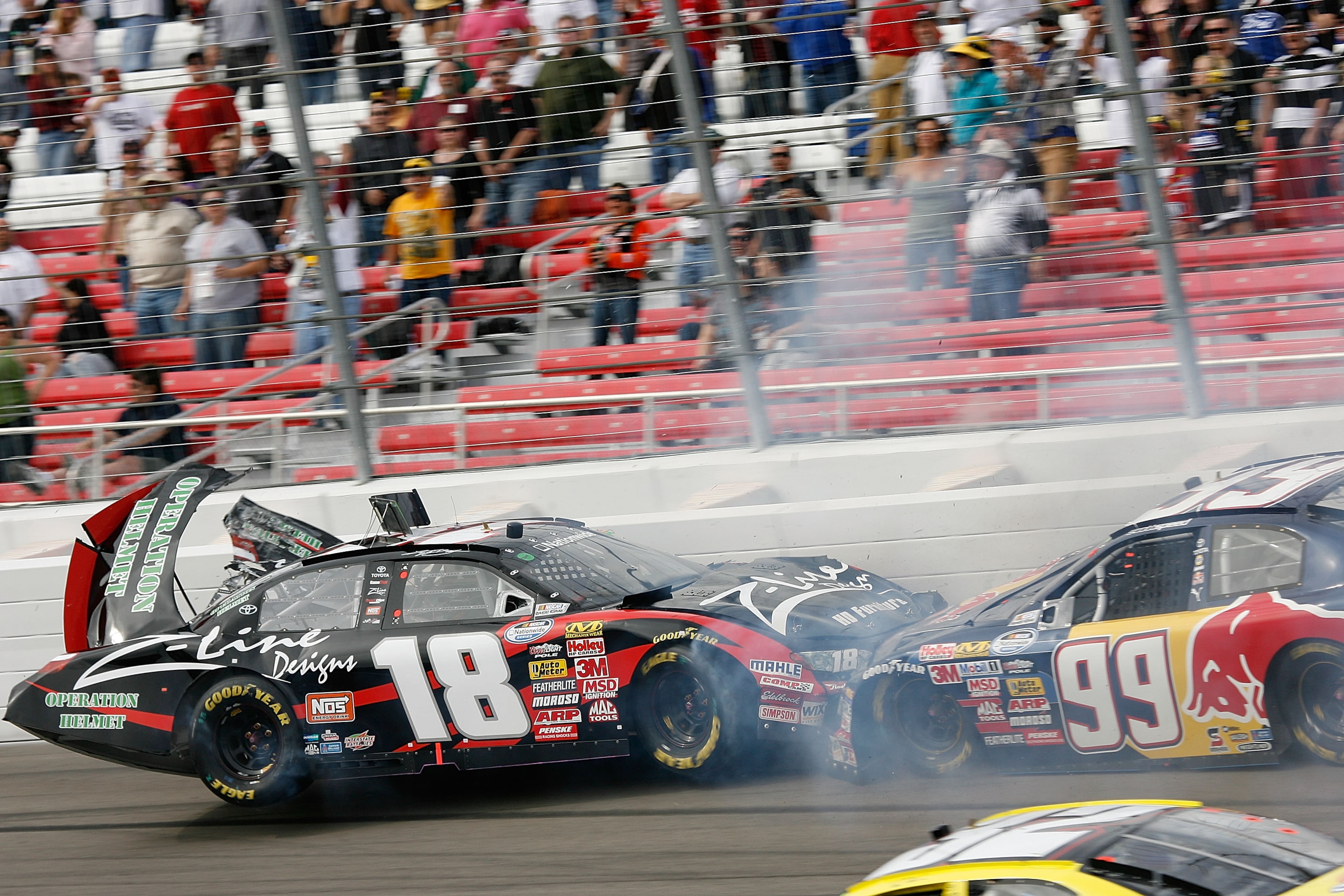 LAS VEGAS - FEBRUARY 28: Kyle Busch driver of the #18 Z-Line Designs Toyota and Scott Speed driver of the #99 Red Bull Toyota crash in turn four during the NASCAR Nationwide Series Sam's Town 300 at the Las Vegas Motor Speedway on February 28, 2009 in La LAS VEGAS - FEBRUARY 28: Kyle Busch driver of the #18 Z-Line Designs Toyota and Scott Speed driver of the #99 Red Bull Toyota crash in turn four during the NASCAR Nationwide Series Sam's Town 300 at the Las Vegas Motor Speedway on February 28, 2009 in La