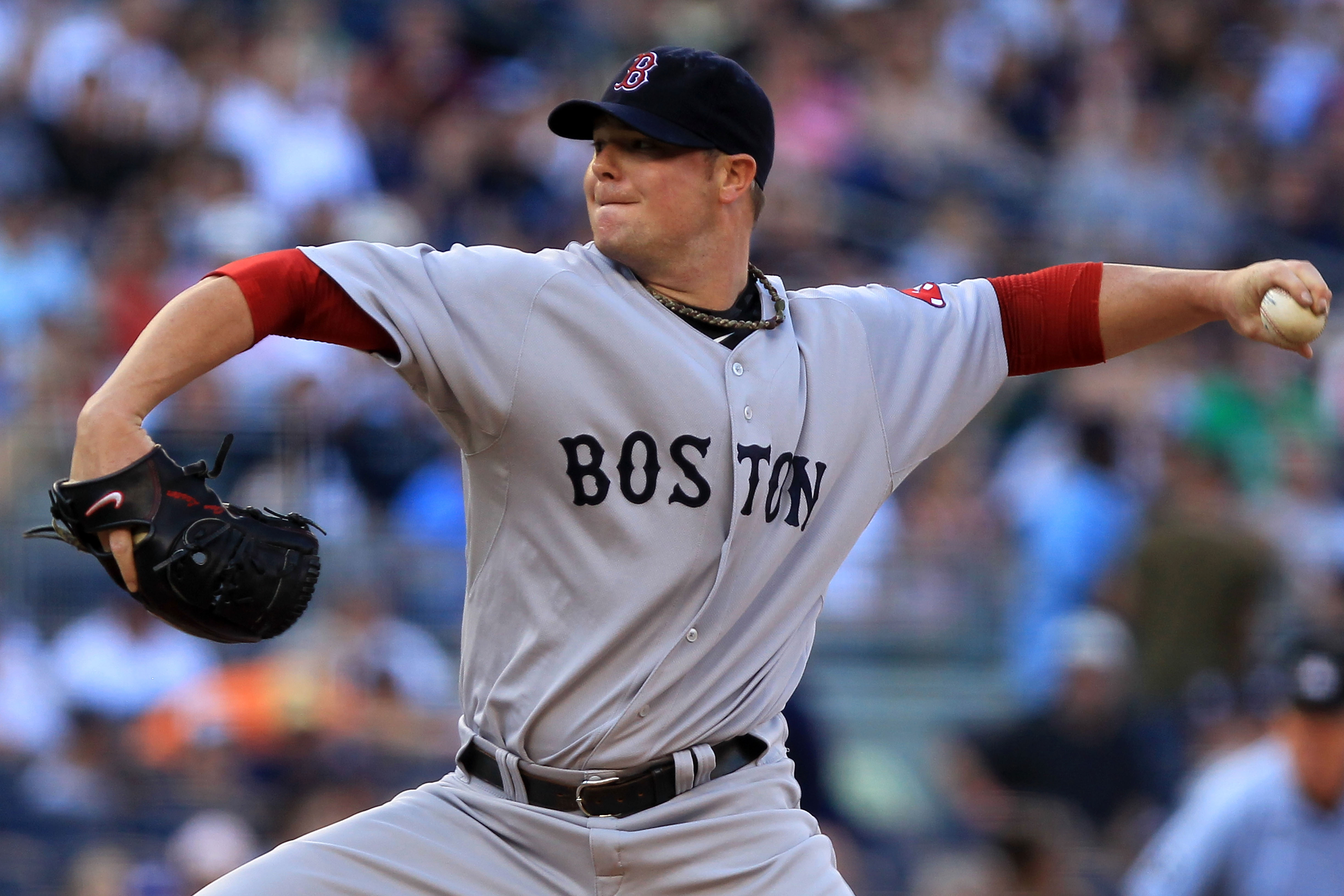 NEW YORK - SEPTEMBER 25:  Jon Lester #31 of the Boston Red Sox pitches against the New York Yankees during their game on September 25, 2010 at Yankee Stadium in the Bronx borough of New York City.  (Photo by Chris McGrath/Getty Images)