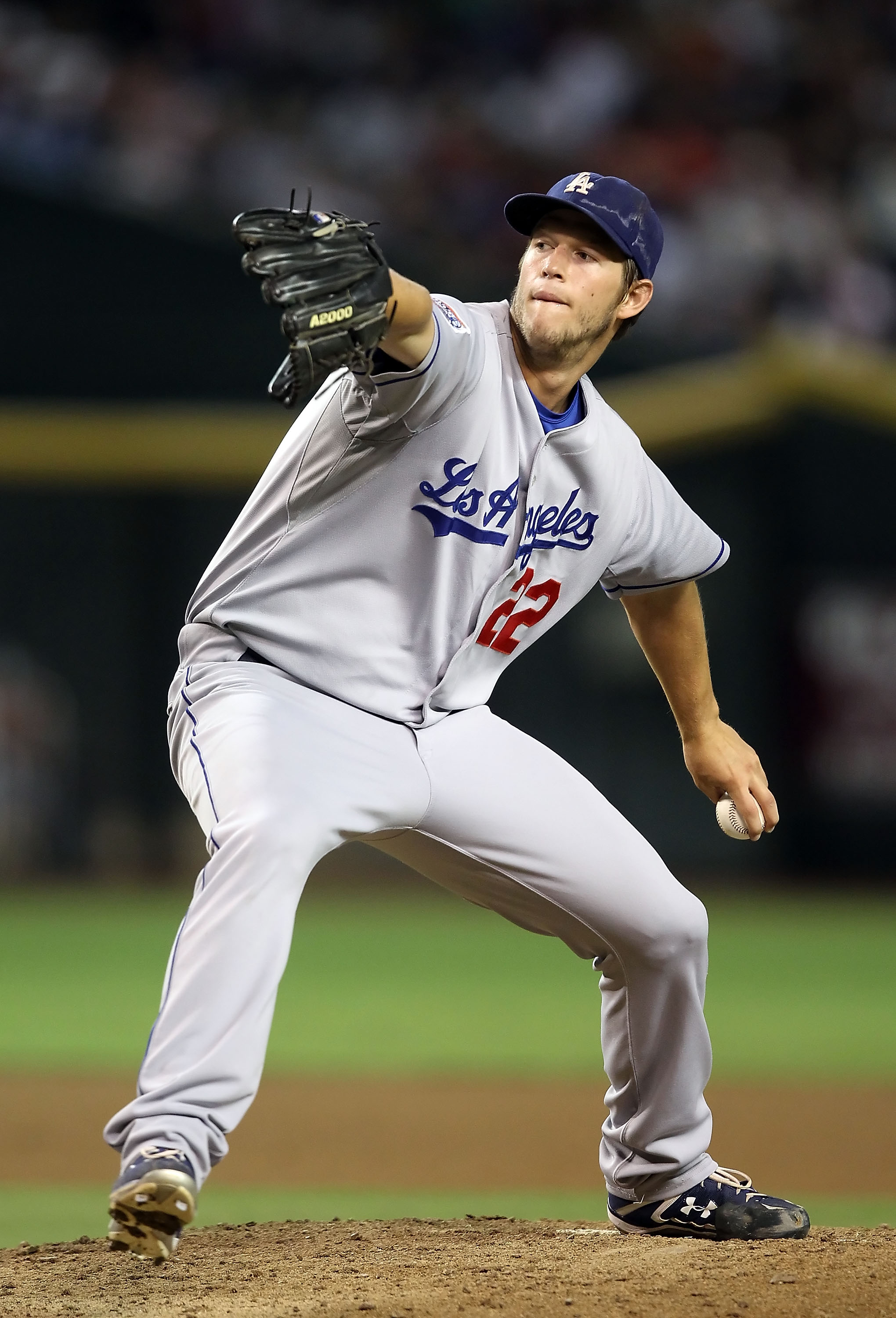 PHOENIX - SEPTEMBER 24:  Starting pitcher Clayton Kershaw #22 of the Los Angeles Dodgers pitches against the Arizona Diamondbacks during the Major League Baseball game at Chase Field on September 24, 2010 in Phoenix, Arizona.  (Photo by Christian Petersen