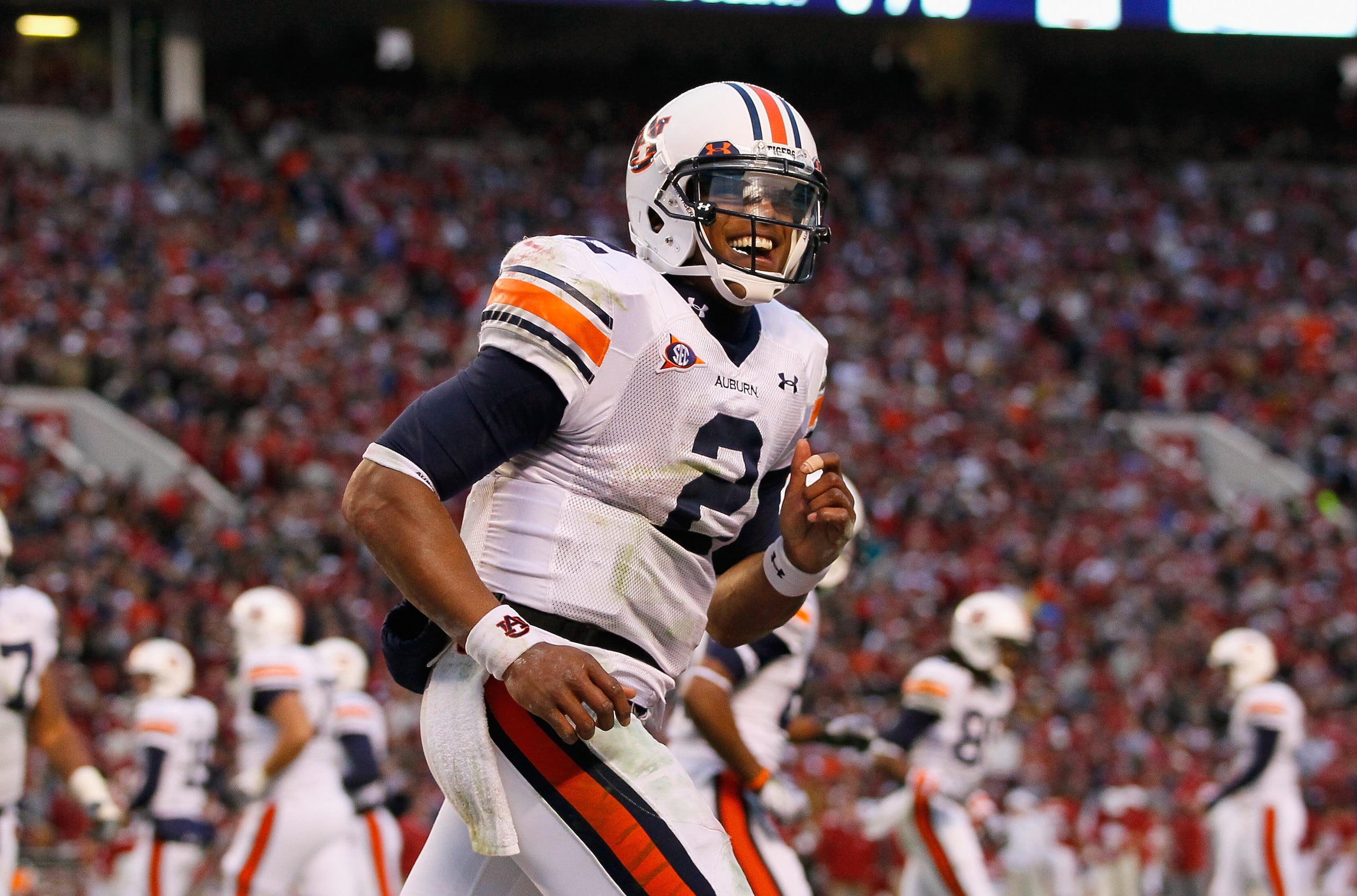 TUSCALOOSA, AL - NOVEMBER 26:  Quarterback Cam Newton #2 of the Auburn Tigers reacts after a touchdown against the Alabama Crimson Tide at Bryant-Denny Stadium on November 26, 2010 in Tuscaloosa, Alabama.  (Photo by Kevin C. Cox/Getty Images)