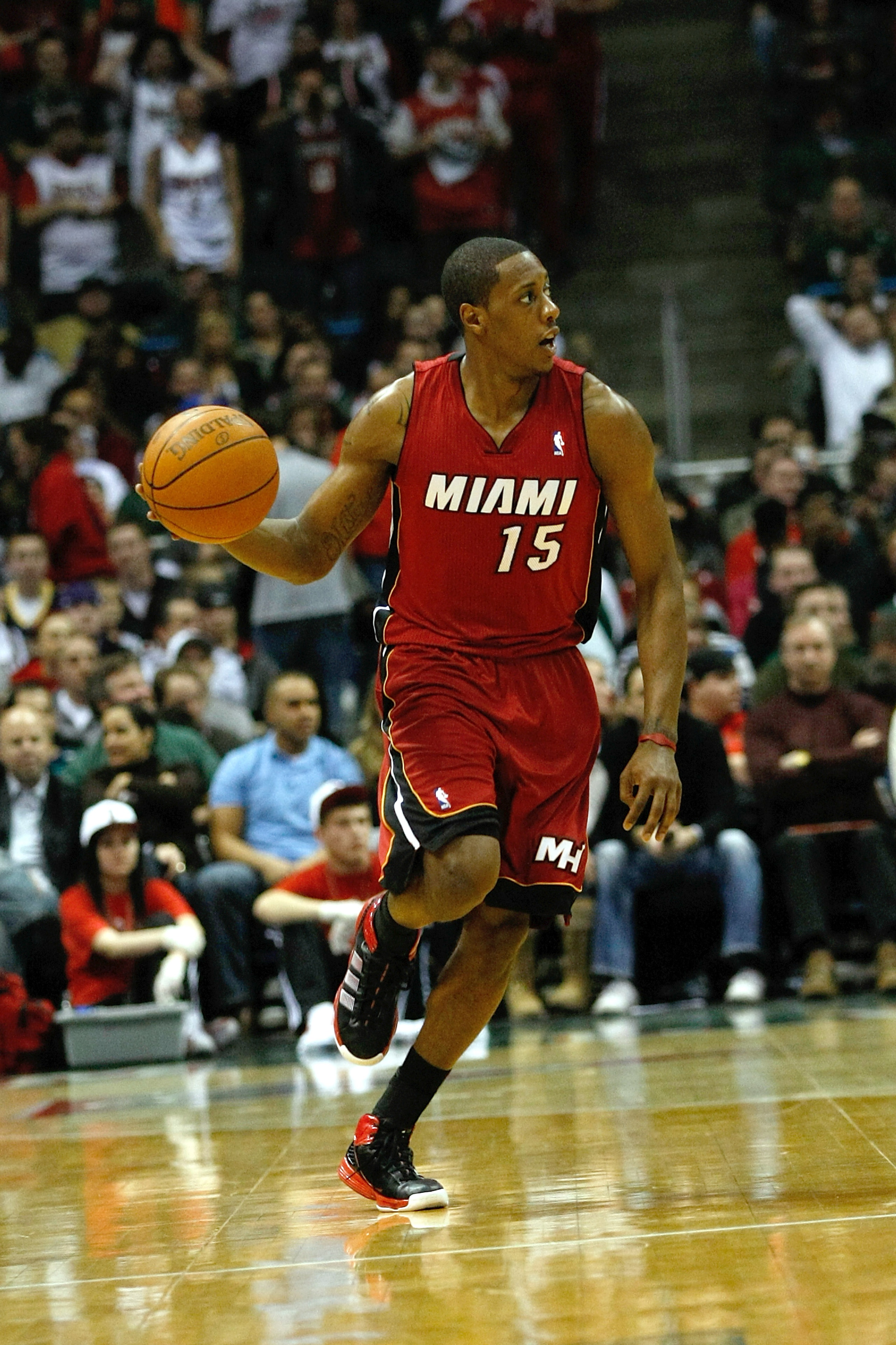 MILWAUKEE, WI - JANUARY 07: Mario Chalmers #15 of the Milwaukee Bucks dribbles against the Miami Heat at the Bradley Center on January 7, 2011 in Milwaukee, Wisconsin. NOTE TO USER: User expressly acknowledges and agrees that, by downloading and or using MILWAUKEE, WI - JANUARY 07: Mario Chalmers #15 of the Milwaukee Bucks dribbles against the Miami Heat at the Bradley Center on January 7, 2011 in Milwaukee, Wisconsin. NOTE TO USER: User expressly acknowledges and agrees that, by downloading and or using
