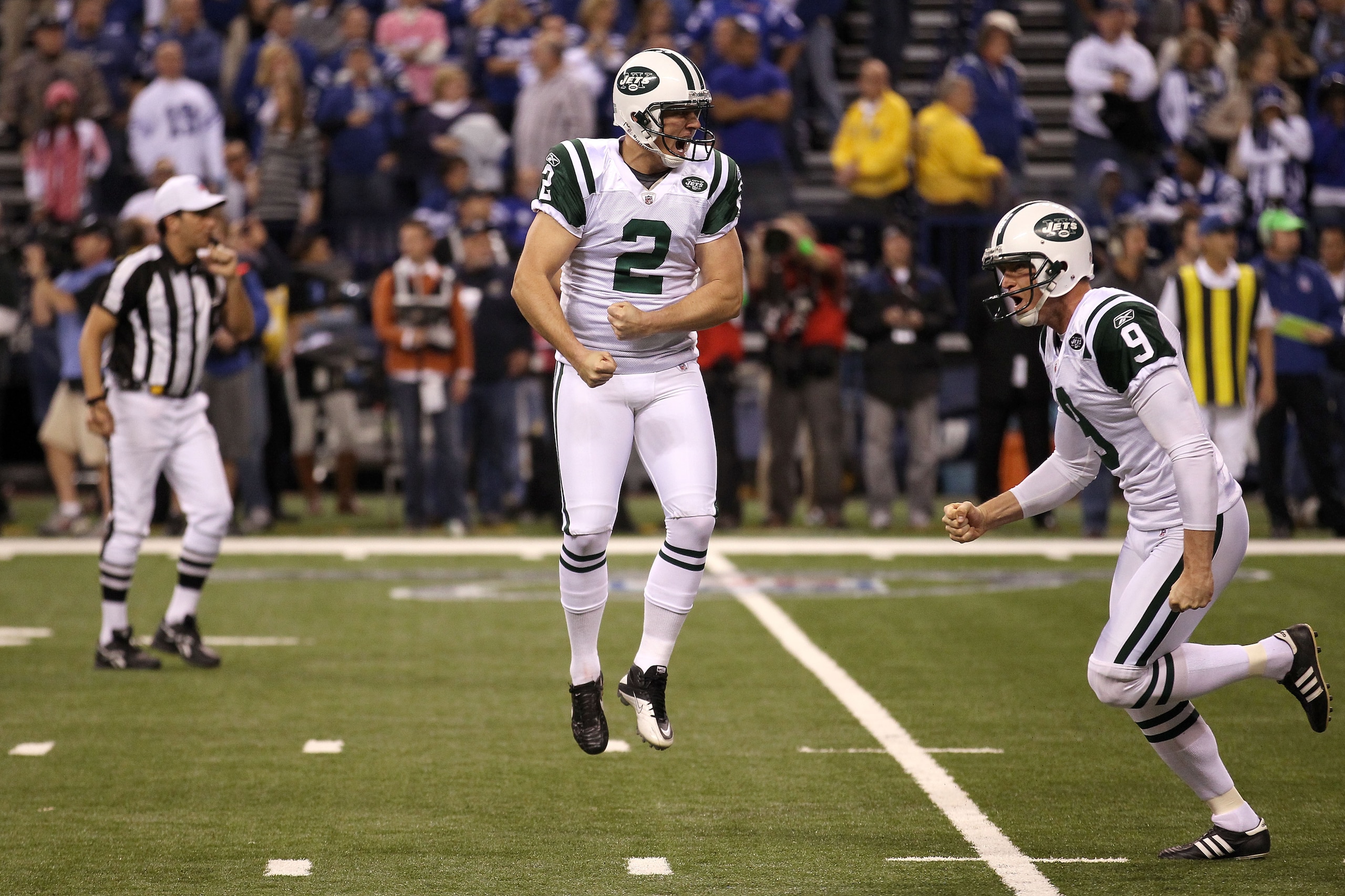 INDIANAPOLIS, IN - JANUARY 08: Place kicker Nick Folk #2 and Steve Weatherford #9 of the New York Jets celebrates after Folk successfully kicked a game-winning a 32-yard field goal in the fourth quarter to win 17-16 against the Indianapolis Colts during INDIANAPOLIS, IN - JANUARY 08: Place kicker Nick Folk #2 and Steve Weatherford #9 of the New York Jets celebrates after Folk successfully kicked a game-winning a 32-yard field goal in the fourth quarter to win 17-16 against the Indianapolis Colts during