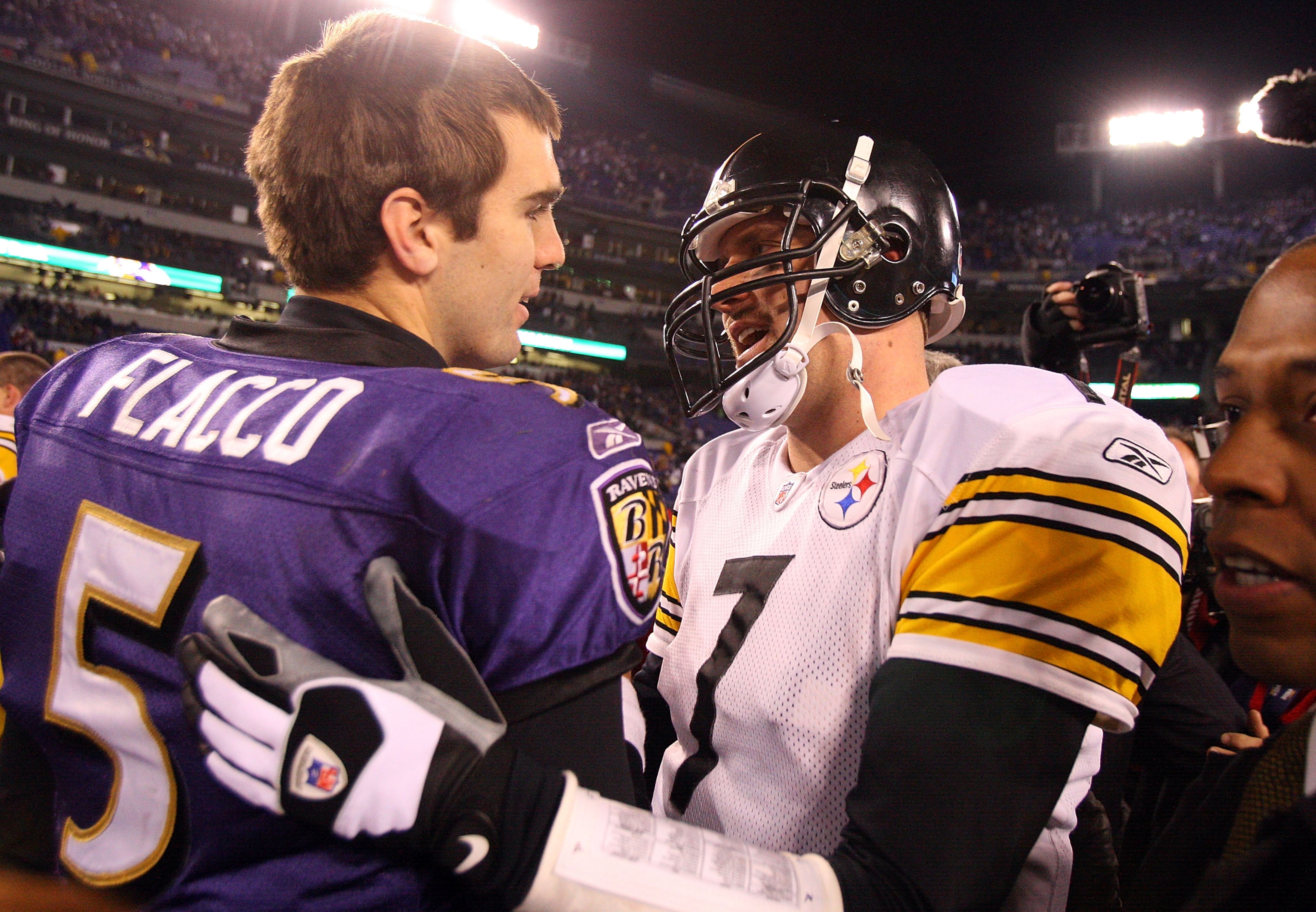 BALTIMORE - DECEMBER 14: Joe Flacco #5 of the Baltimore Ravens meets with Ben Roethlisberger #7 of the Pittsburgh Steelers on December 14, 2008 at M&T Bank Stadium in Baltimore, Maryland. The Steelers defeated the Ravens 13-9. (Photo by Jim McIsaac/Gett BALTIMORE - DECEMBER 14: Joe Flacco #5 of the Baltimore Ravens meets with Ben Roethlisberger #7 of the Pittsburgh Steelers on December 14, 2008 at M&T Bank Stadium in Baltimore, Maryland. The Steelers defeated the Ravens 13-9. (Photo by Jim McIsaac/Gett