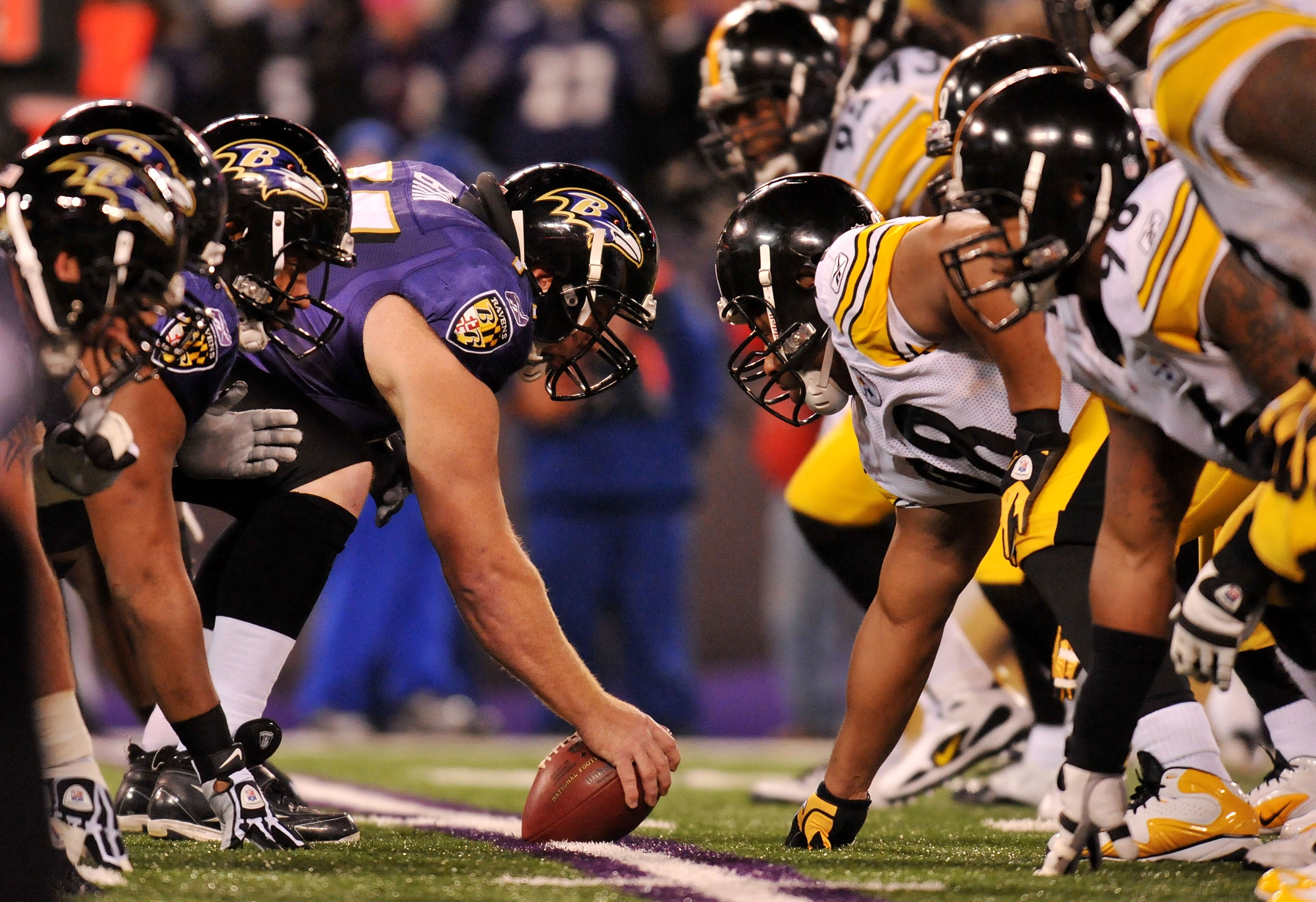 BALTIMORE, MD - DECEMBER 05: Matt Birk #77 of the Baltimore Ravens prepares to snap the ball against the Pittsburgh Steelers at M&T Bank Stadium on December 5, 2010 in Baltimore, Maryland. Pittsburgh won 13-10. (Photo by Larry French/Getty Images) BALTIMORE, MD - DECEMBER 05: Matt Birk #77 of the Baltimore Ravens prepares to snap the ball against the Pittsburgh Steelers at M&T Bank Stadium on December 5, 2010 in Baltimore, Maryland. Pittsburgh won 13-10. (Photo by Larry French/Getty Images)